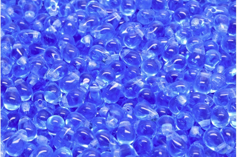 アウトレット 10グラム ティアドロップペアビーズ 4 x 6 mm 透明ブルー (30040) ガラス チェコ共和国