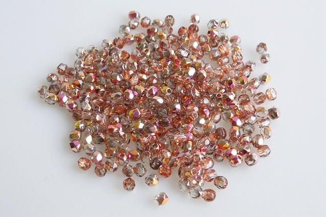 ファセットラウンドファイアポリッシュビーズ、クリスタルクリスタルピンクイエローコーティング(00030-27137)、ガラス、チェコ共和国