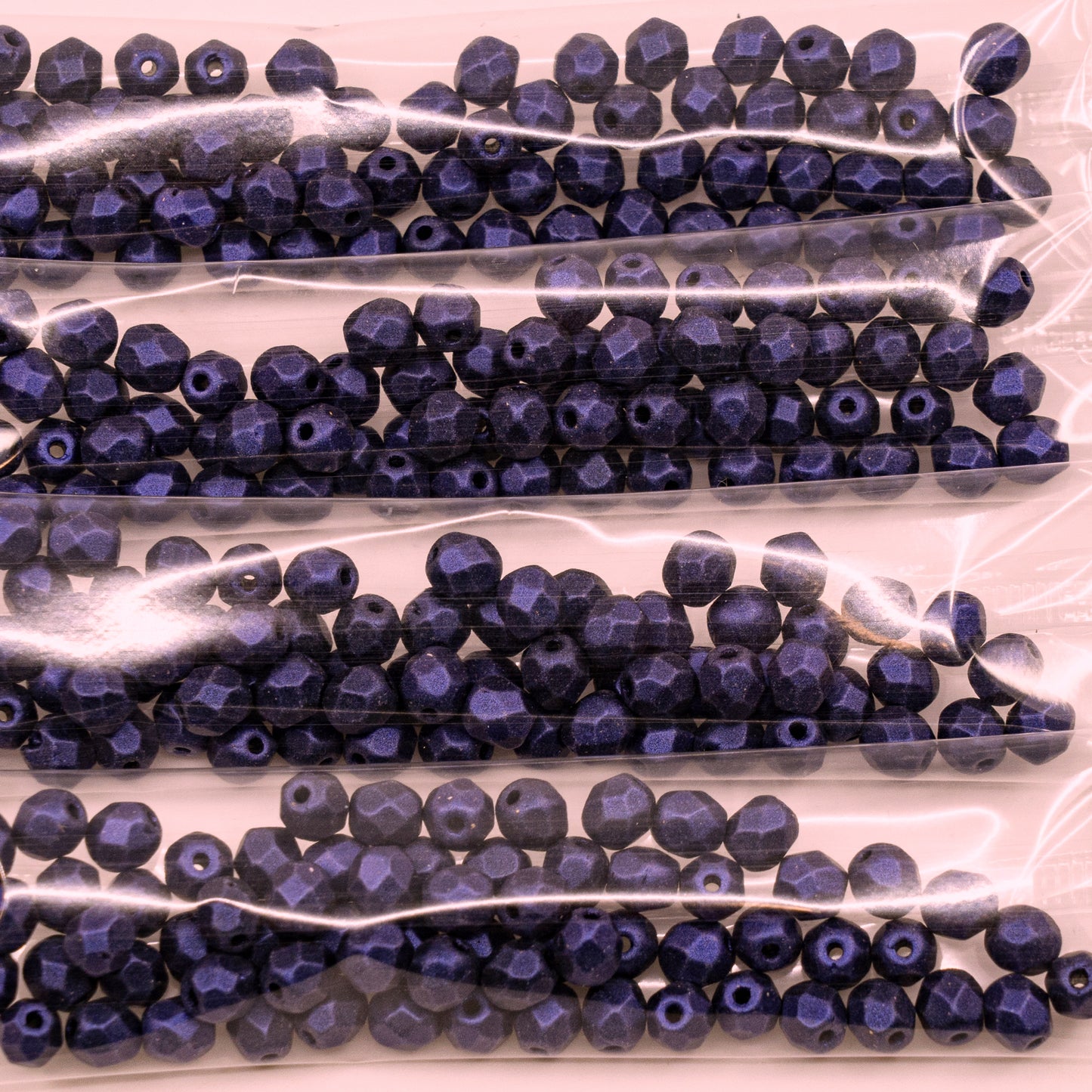 OUTLET 10 grams Faceted Round Fire Polished Beads, 5 x 5 mm, Black IRI-Purple (23980-79200), Glass, Czech Republic