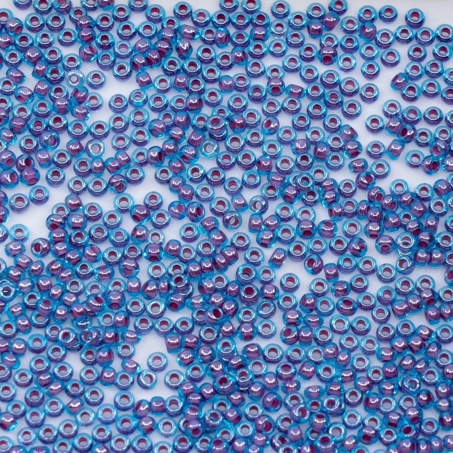 OUTLET 10 grams Preciosa Ornela Seed Beads, Round Hole, Loose, 10/0, aquamarine, colour lined pink, sfinx (61018), Glass, Czech Republic