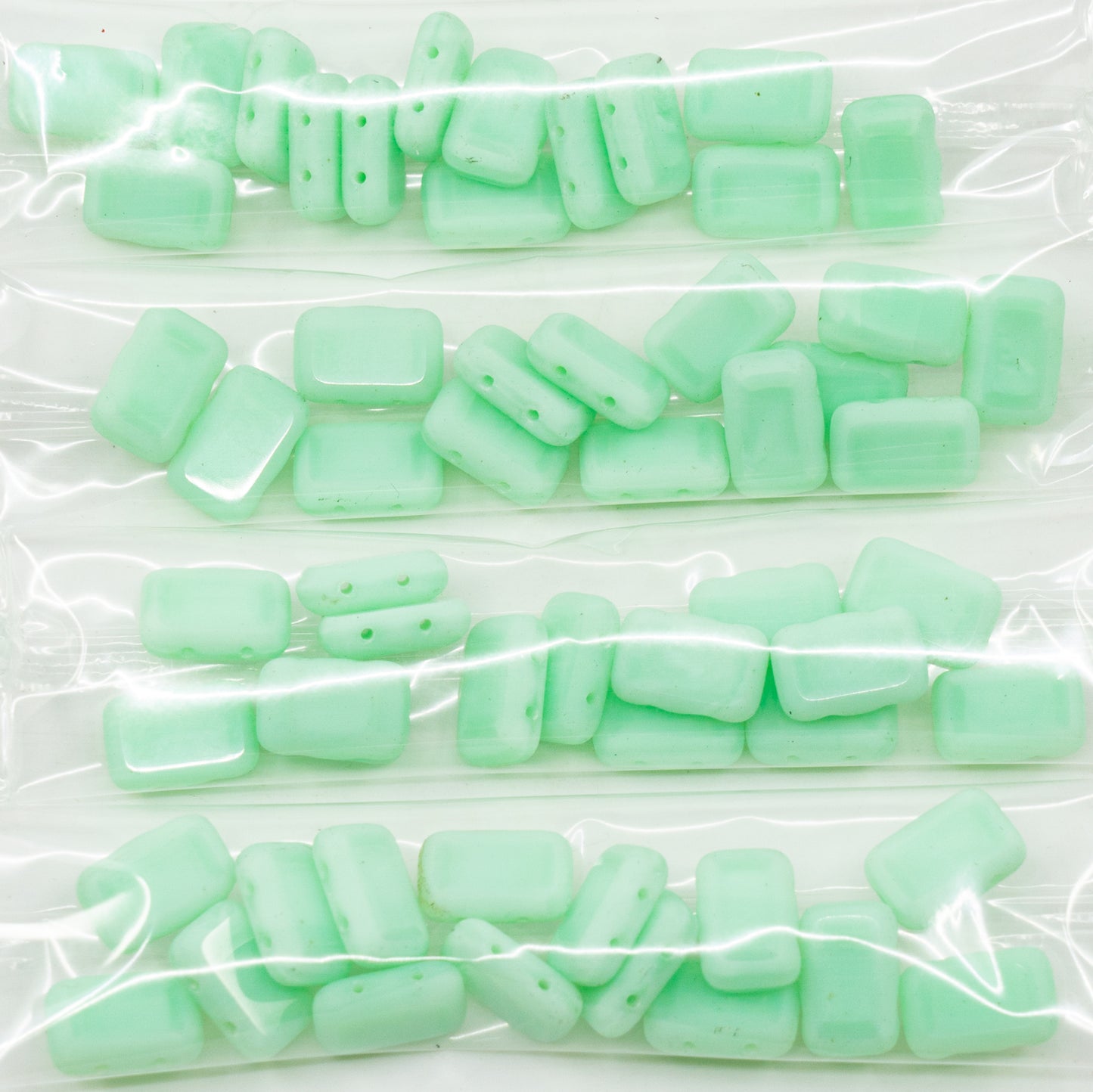 アウトレット 10グラム テーブルカット長方形ビーズ、ターコイズグリーン 2穴(54200-2穴)、ガラス、チェコ共和国