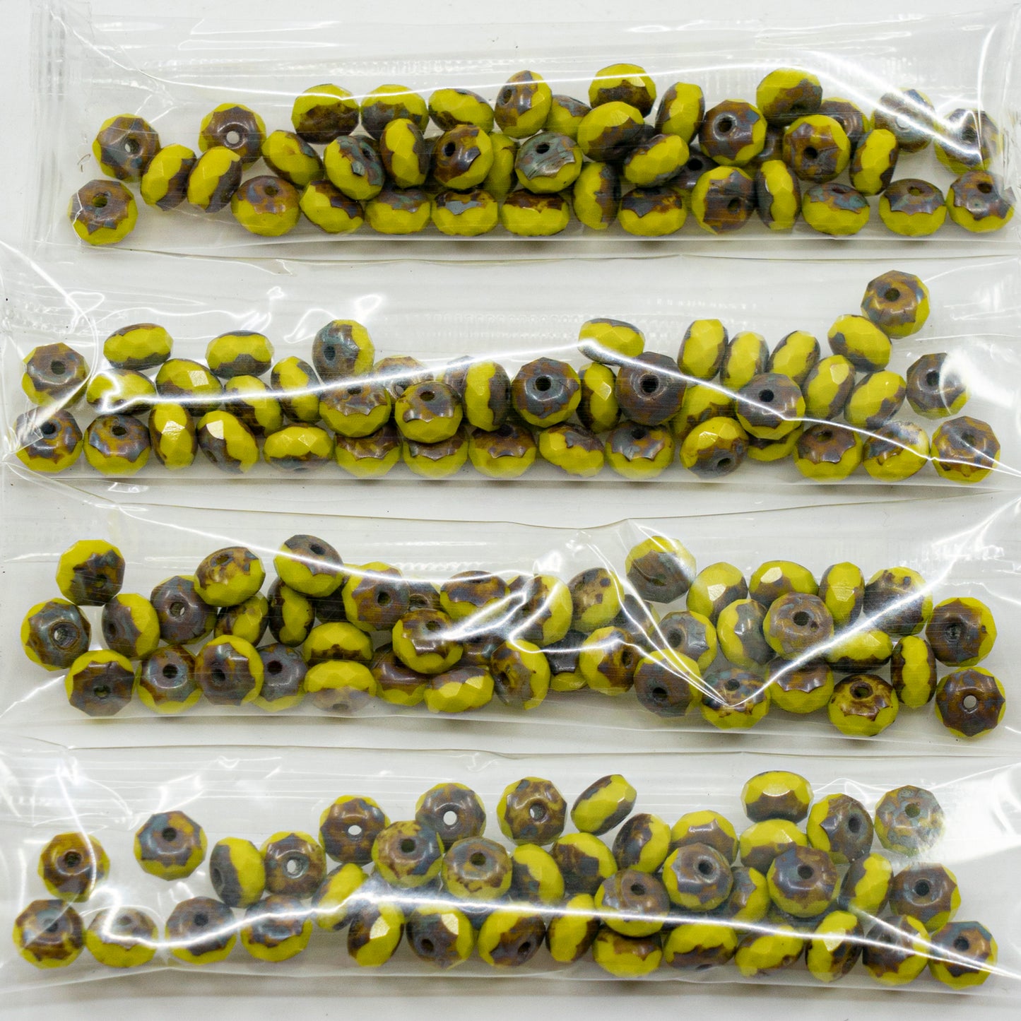 OUTLET 10 grams Faceted Rondelle Fire Polished Beads, 5 x 7 mm, Opaque Green Travertin (53400-86800), Glass, Czech Republic