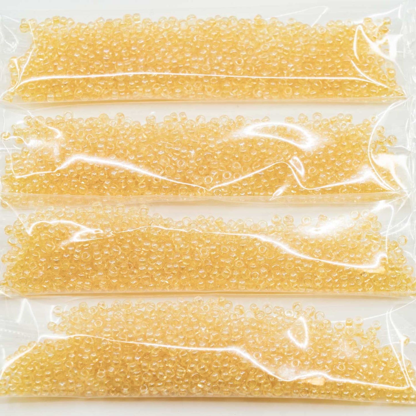 アウトレット 10グラム プレシオサ オルネラ シードビーズ コーティング、11/0、クリスタルラスターイエローフルコーティング(-00050-14483)、ガラス、チェコ共和国