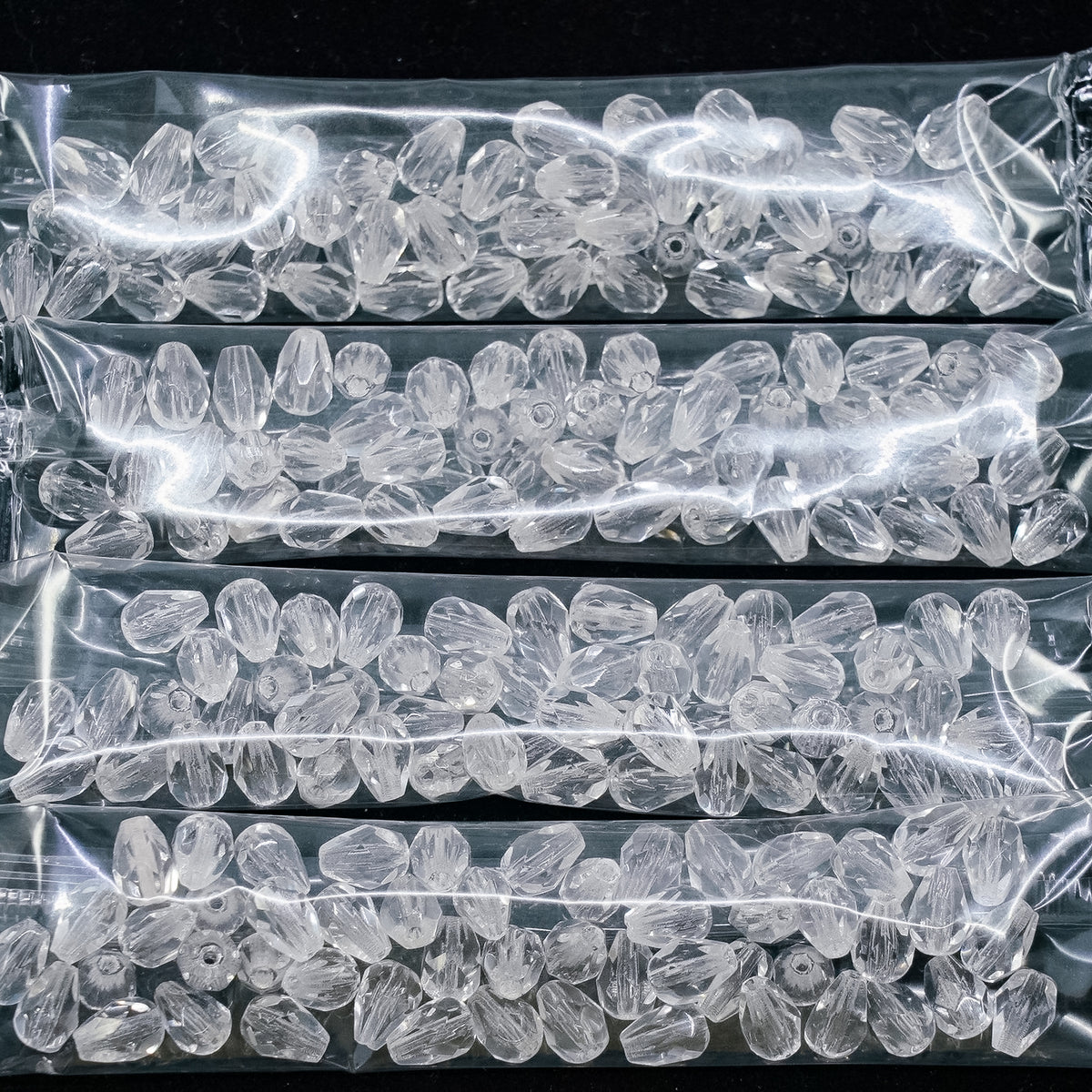 OUTLET 10 grams Pear Teardrop Beads Faceted Fire Polished, 7 x 5 mm, Crystal (00030), Glass, Czech Republic