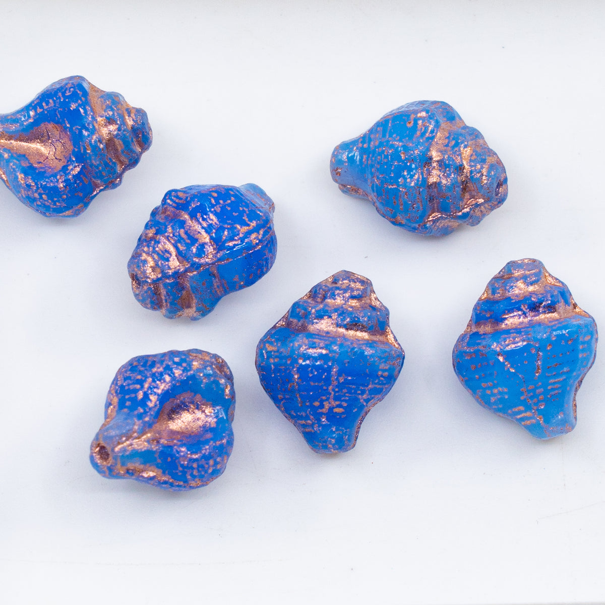 OUTLET 10 grams Murex Shell Beads, 15 x 12 mm, Opal Blue Copper Lined (31010-54307), Glass, Czech Republic