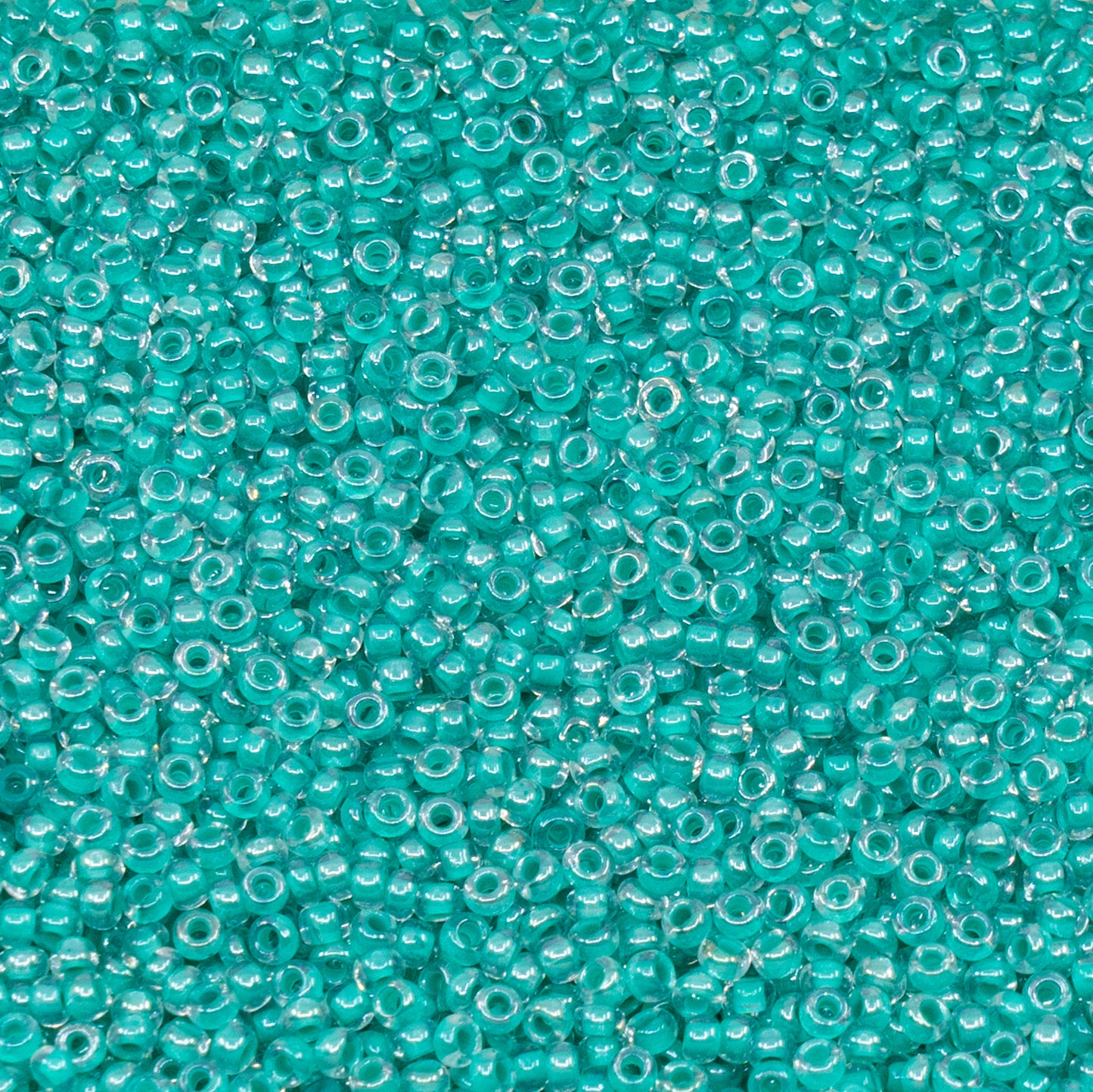 OUTLET 10 grams Preciosa Ornela Seed Beads, Round Hole, Loose, 10/0, crystal, colour lined green, sfinx (38658), Glass, Czech Republic