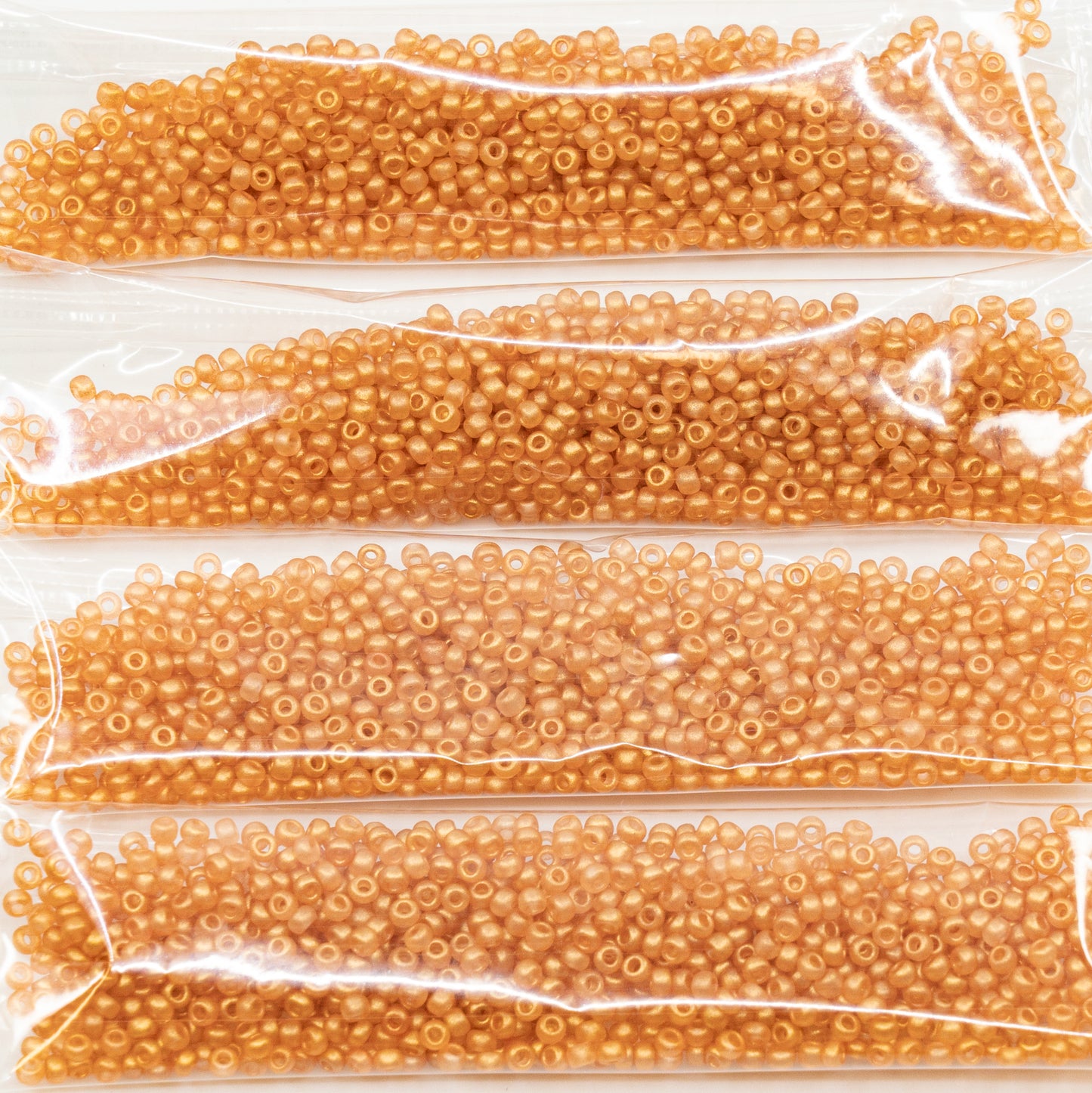 奥特莱斯 10 克宝仕奥莎 Ornela 种子珠,圆孔,散装,10/0,橙色半透明 (00050-51586),玻璃,捷克共和国