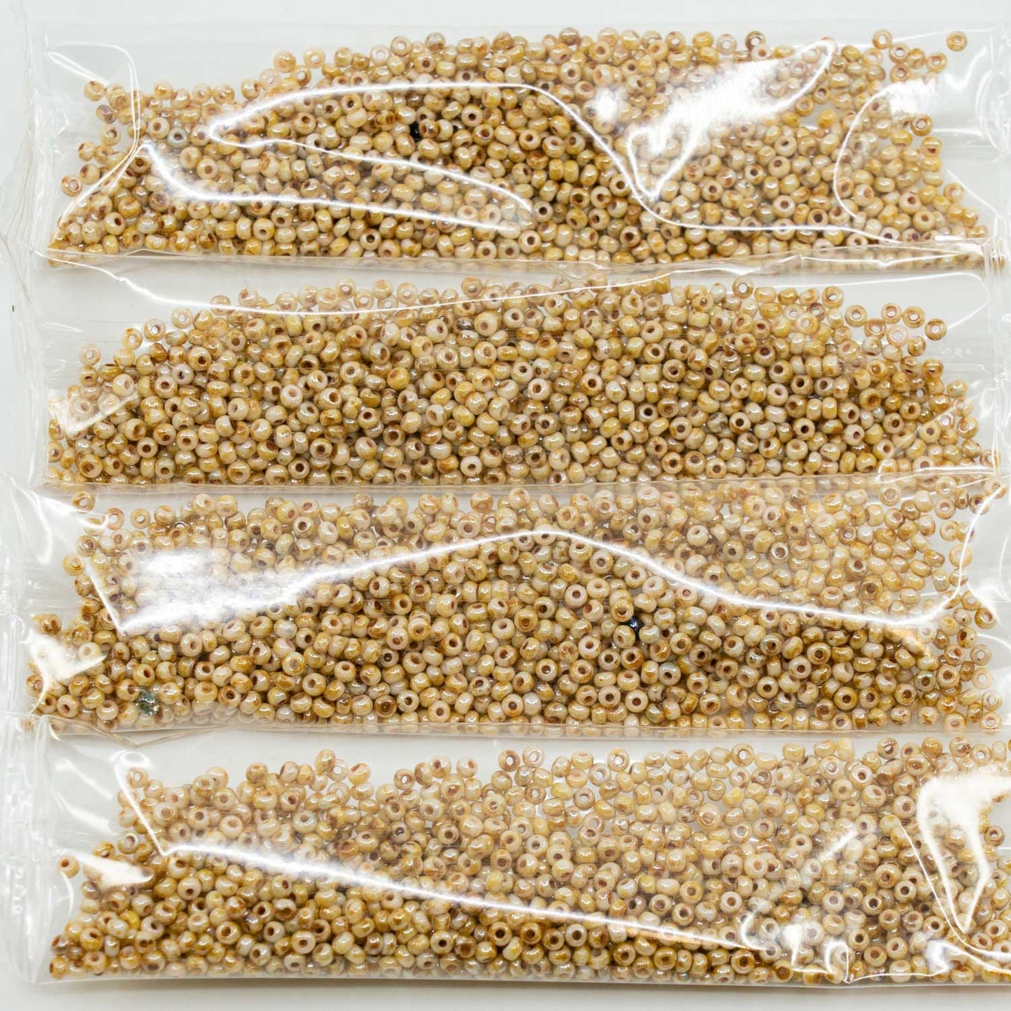 アウトレット 10グラム プレシオサ オルネラ シードビーズ コーティング、11/0、ホワイトチョークステイン、光沢アンバー(-03050-65401)、ガラス、チェコ共和国