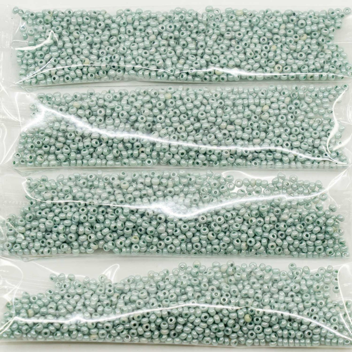 アウトレット 10グラム プレシオサ オルネラ シードビーズ コーティング、11/0、ホワイトチョーク ラスターグリーン フルコーティング (-03050-14457)、ガラス、チェコ共和国