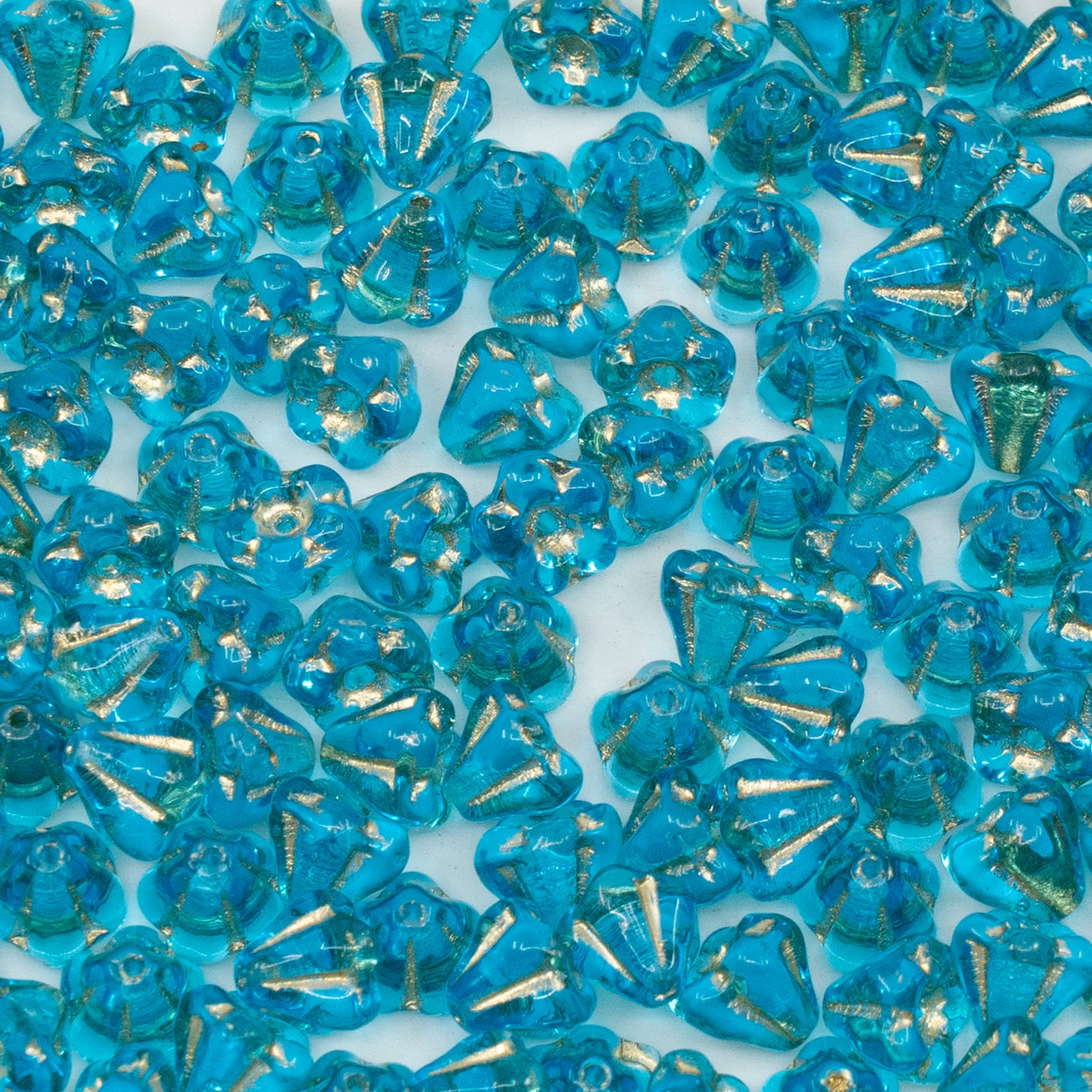 OUTLET 250g/50g Bell Flower Beads, 4 x 6 mm, Transparent Aqua Gold Lined (60020-54302), Glass, Czech Republic
