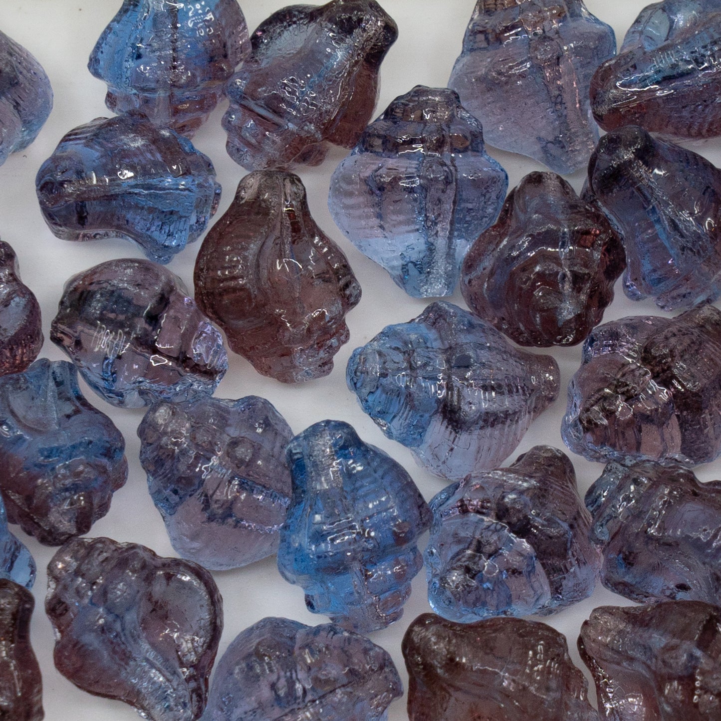 OUTLET 250g/50g Murex Shell Beads, 15 x 12 mm, Transparent Light Amethyst Transparent Blue (20030-30020), Glass, Czech Republic