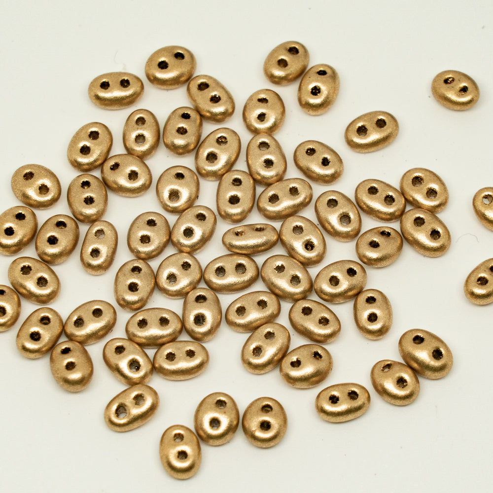 OUTLET 10 grams Preciosa Twin 2-hole Beads (like SuperDuo), 2.5 x 5 mm, Aztec Pale Gold (01710), Glass, Czech Republic