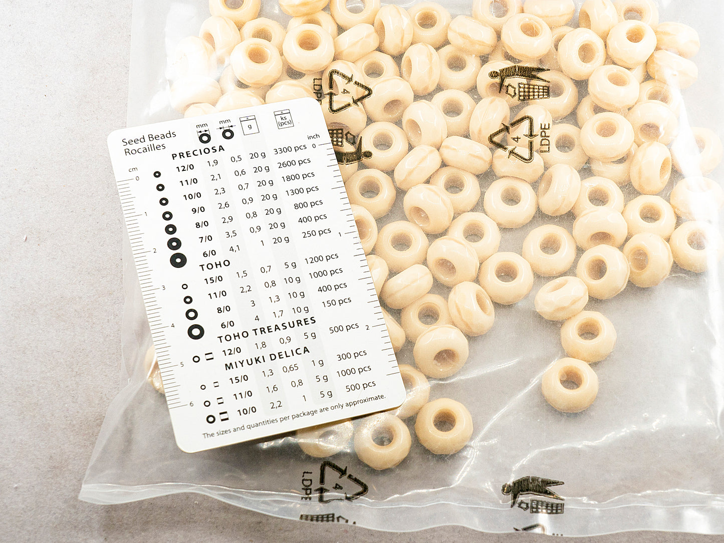 アウトレット 250g ロンデル ラージホール、- x - mm、ベージュ(ベージュ)、ガラス、チェコ共和国