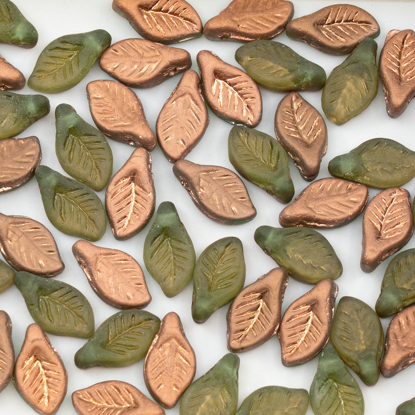 OUTLET 50 grams Bay Leaf Beads, 6 x 12 mm, Transparent Green Matte Rose Gold Capri (50520-84100-27101), Glass, Czech Republic
