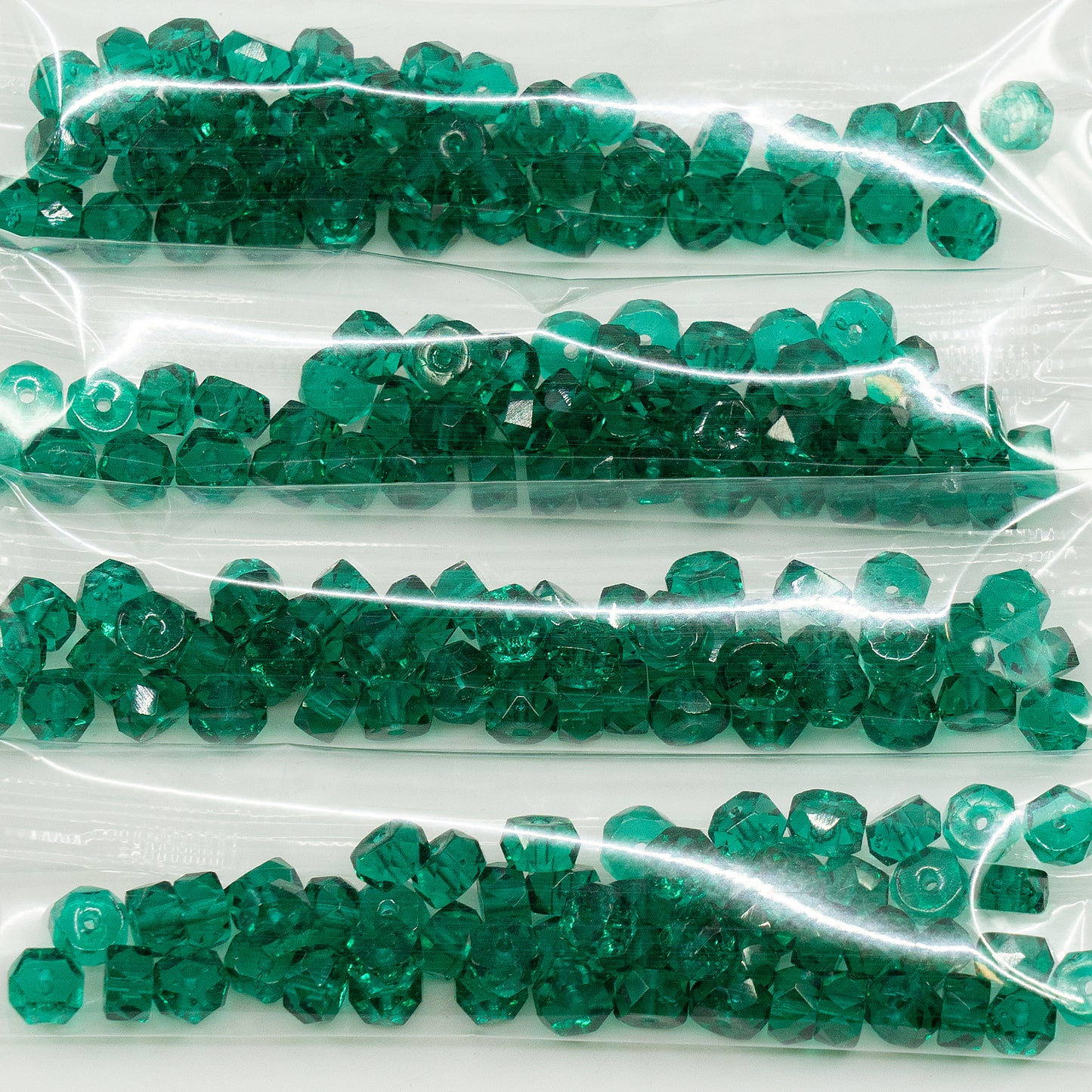 アウトレット 10グラム ファセットロンデル ファイアポリッシュビーズ、3 x 6 mm、透明グリーンエメラルド(50730)、ガラス、チェコ共和国