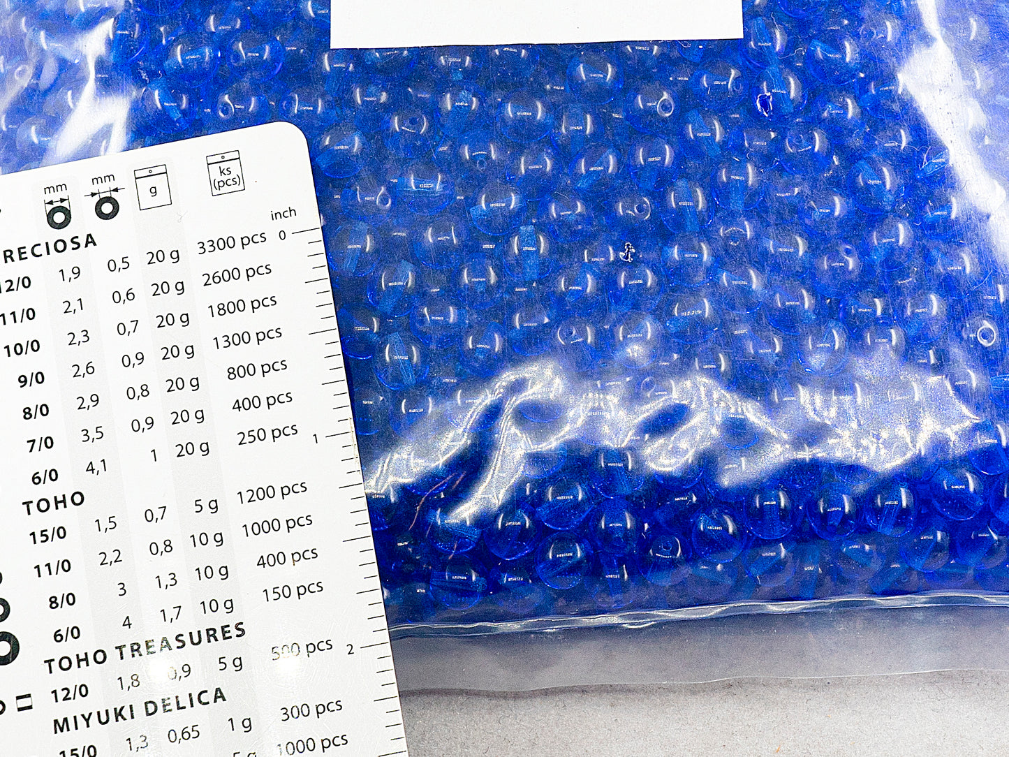 アウトレット 250g ラウンドプレスドドラックビーズ、7 x 7 mm、透明ブルー(30060)、ガラス、チェコ共和国