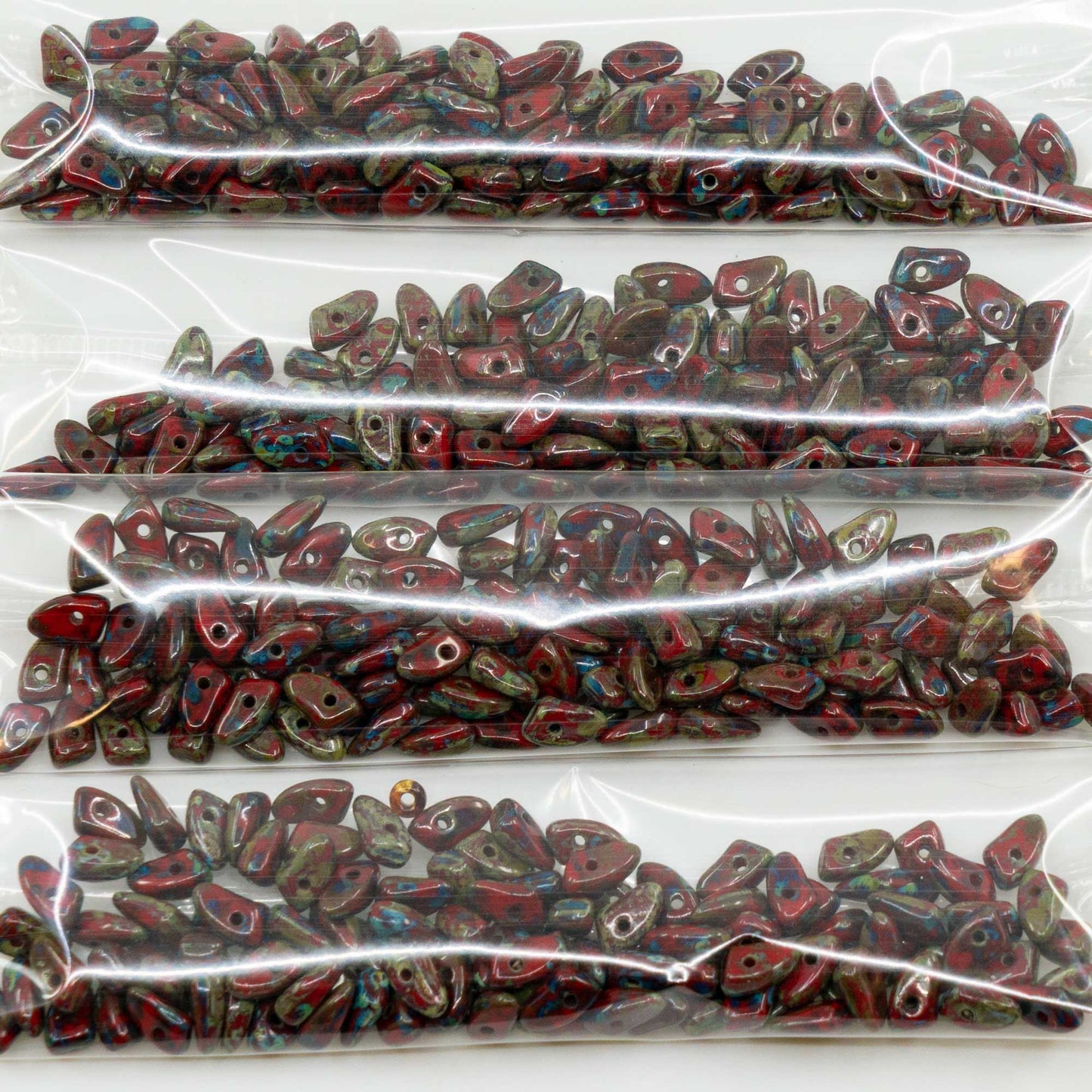 OUTLET 10 grams Tooth Pressed Beads, 6 x 6 mm, Opaque Red Travertin (93200-86800), Glass, Czech Republic