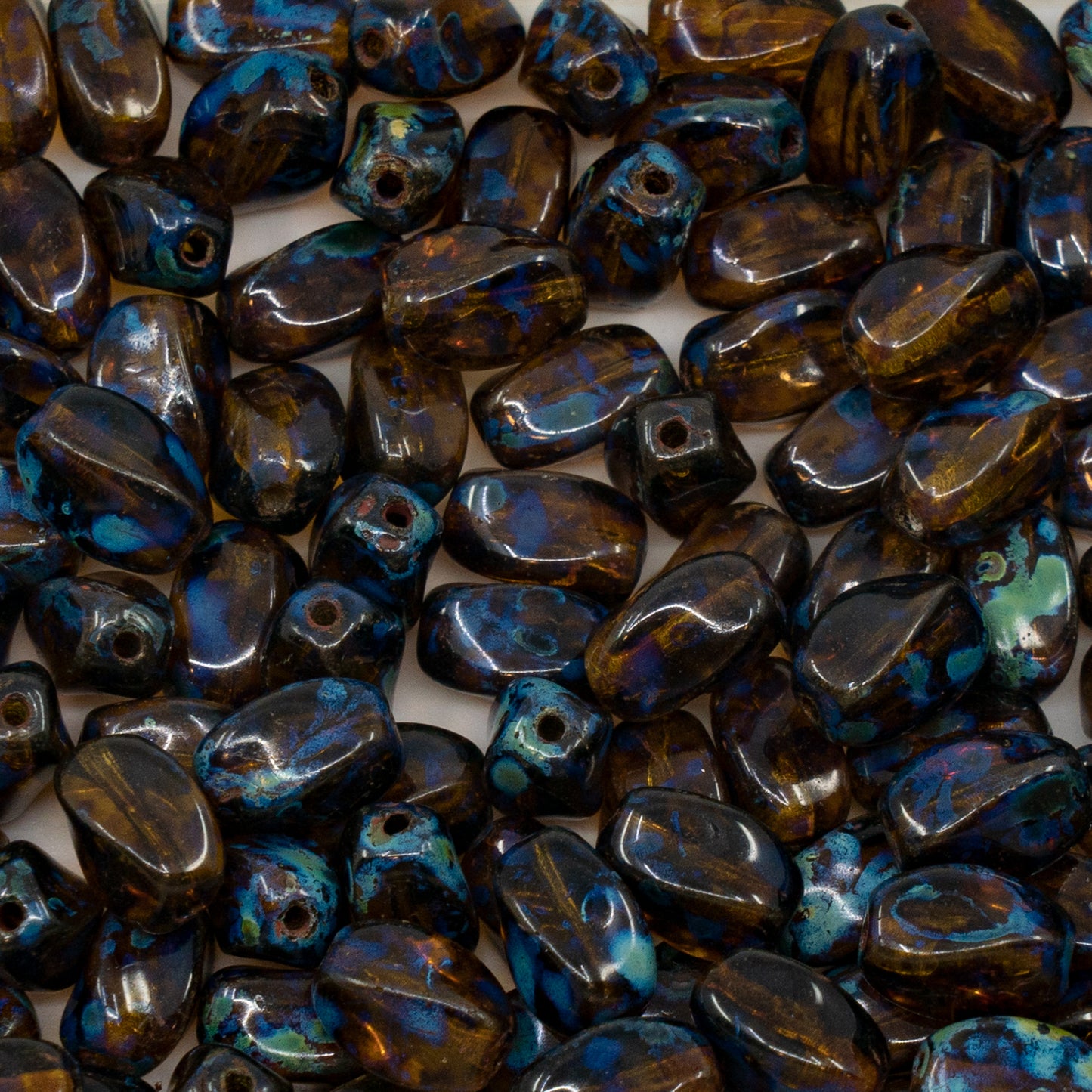 OUTLET 250g Twisted Oval Pressed Glass Beads, 8 x 6 mm, Transparent Green Travertin (50316-86800), Glass, Czech Republic