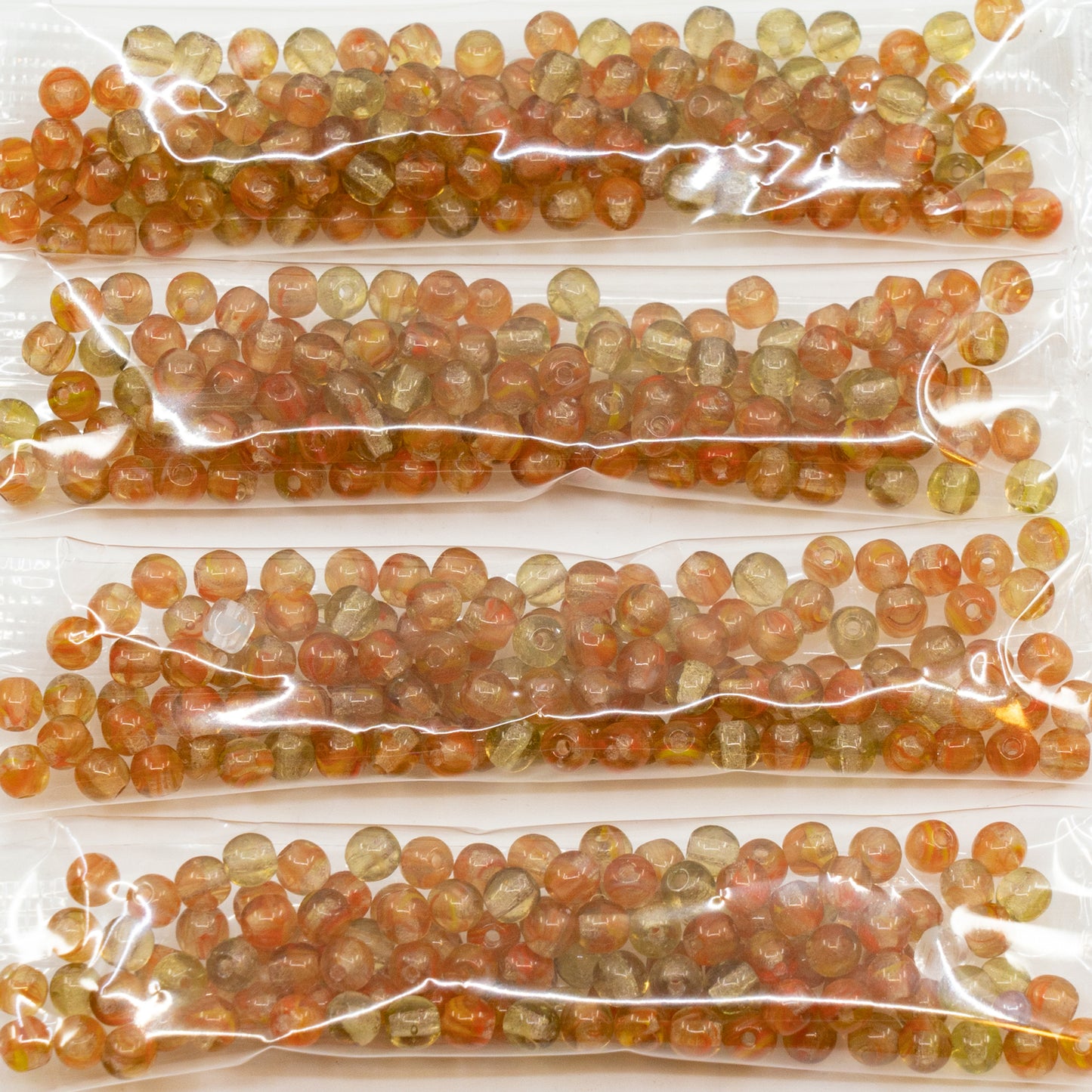 OUTLET 10 grams Round Druck Beads, 4 x 4 mm, Orange Green (orange-green), Glass, Czech Republic