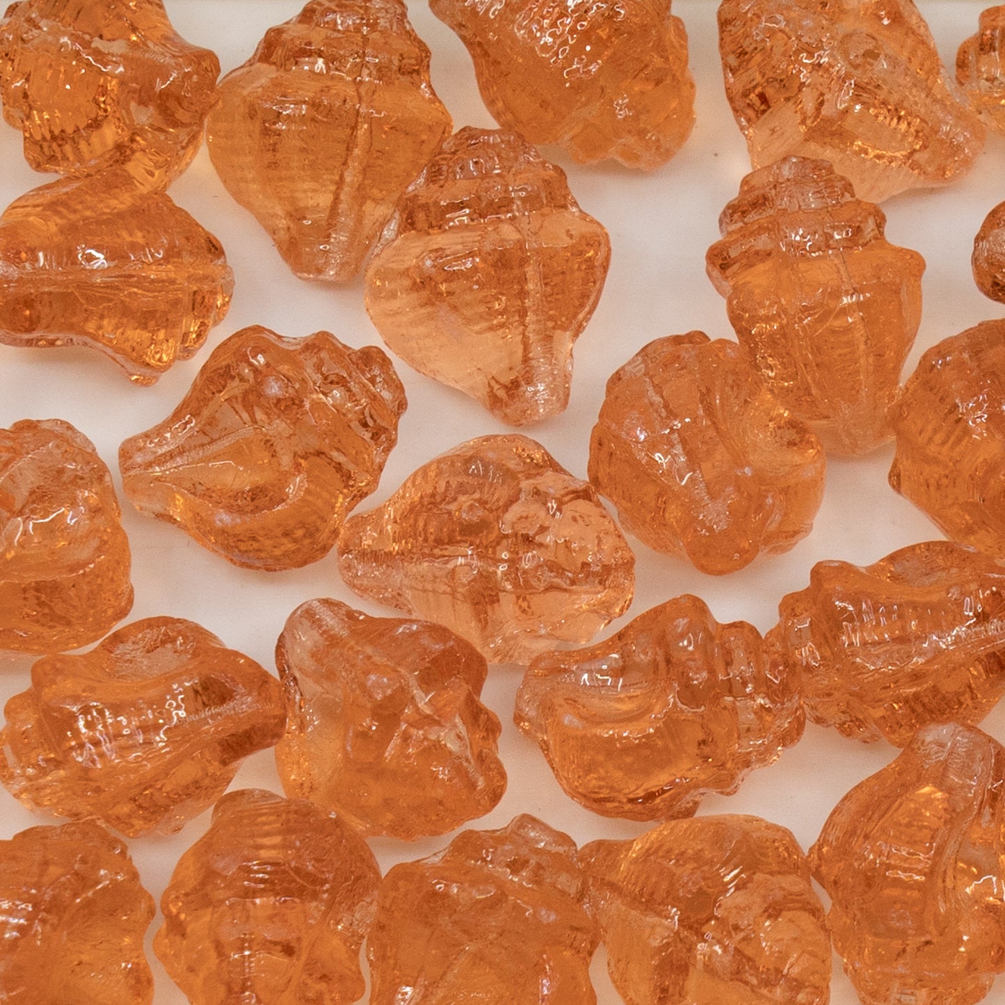 OUTLET 10 grams Murex Shell Beads, 15 x 12 mm, Transparent Pink (70110), Glass, Czech Republic