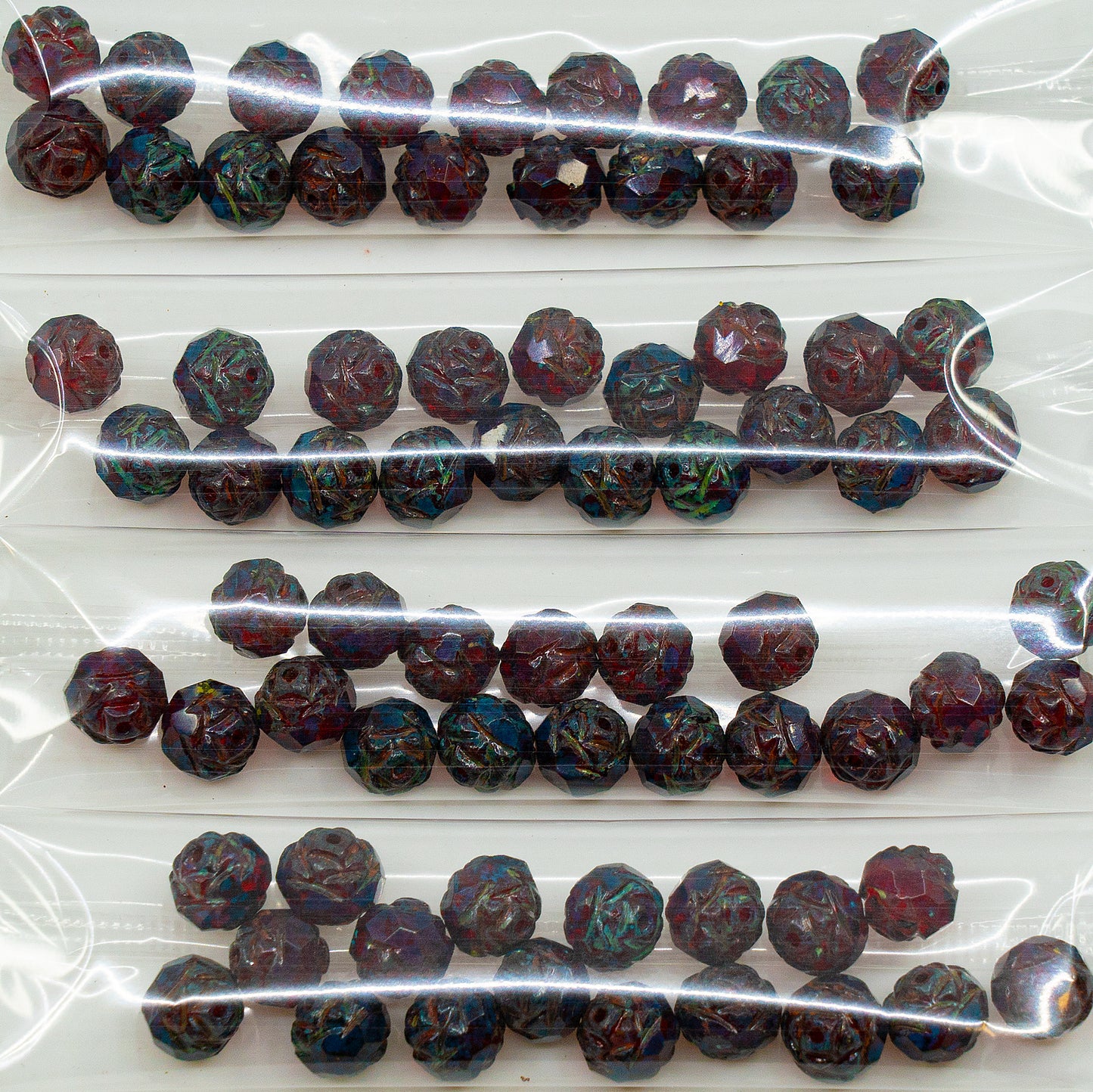 OUTLET 10 grams Cathedral Faceted Fire Polished Beads, 7 x 8 mm, Ruby Red Travertin (90080-86800), Glass, Czech Republic