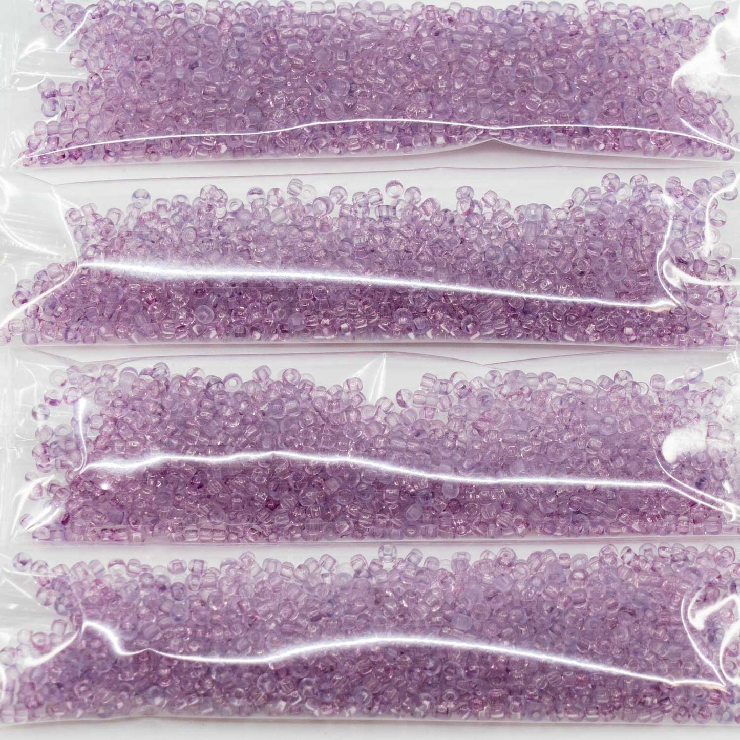 アウトレット 10グラム プレシオサ オルネラ シードビーズ コーティング、11/0、クリスタルラスター リラ (-00050-14494)、ガラス、チェコ共和国