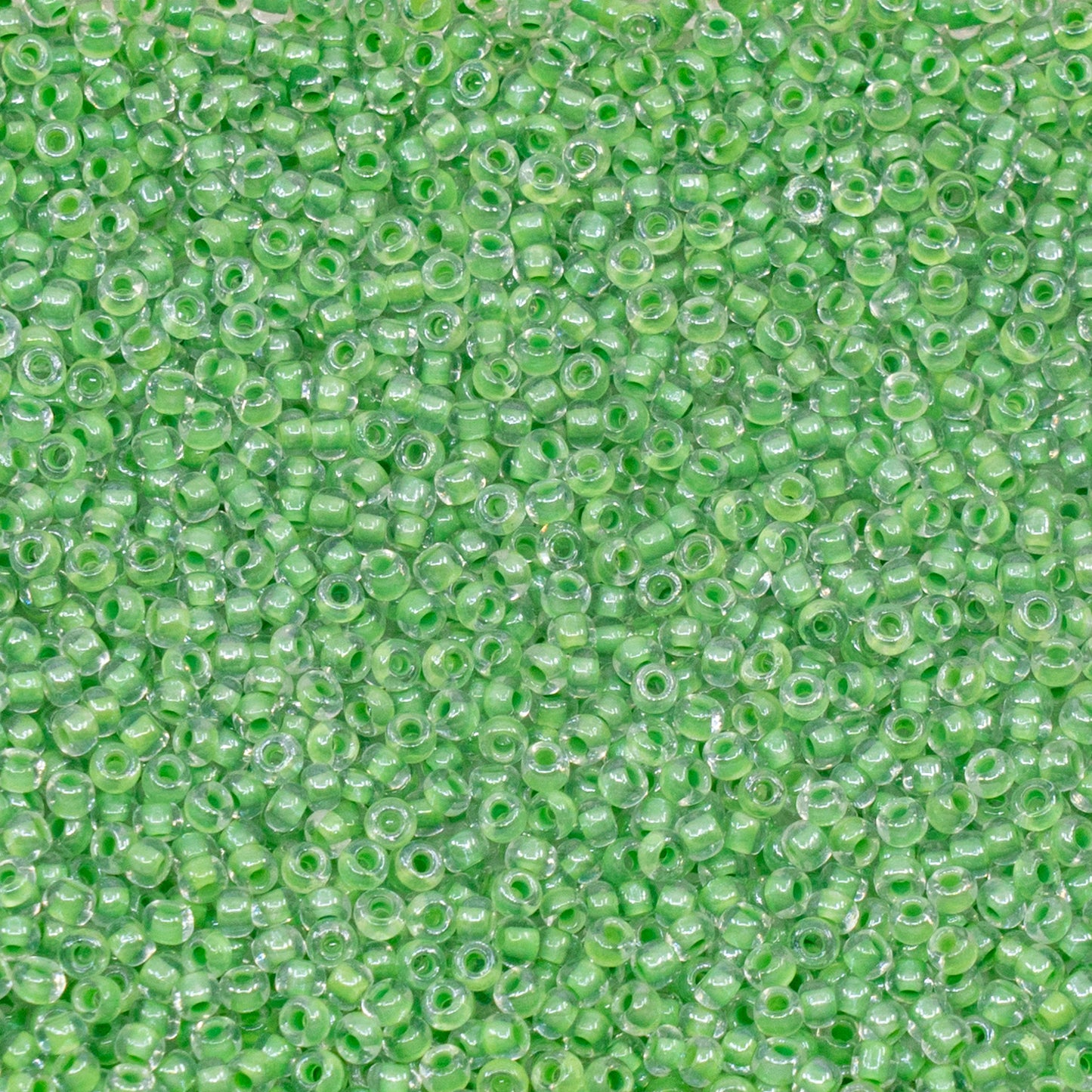 OUTLET 10 grams Preciosa Ornela Seed Beads, Round Hole, Loose, 10/0, crystal, colour lined green, sfinx (38657), Glass, Czech Republic