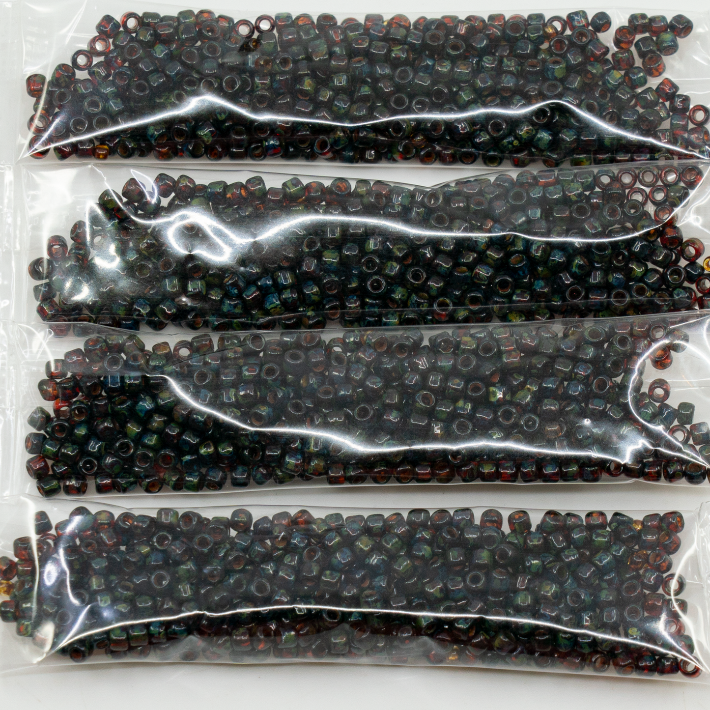 OUTLET 10 grams TOHO Round Seed Beads, 8/0, Transparent Siam Ruby Hybrid Picasso (#5b-T), Glass, Czech Republic