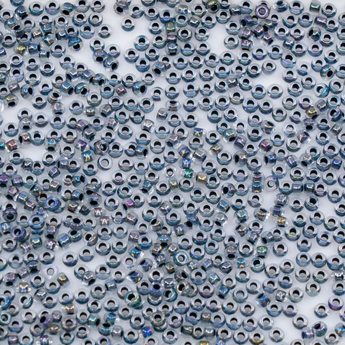 OUTLET 10 grams Preciosa Ornela Seed Beads, Round Hole, Loose, 10/0, crystal, colour lined black, rainbow (58549), Glass, Czech Republic