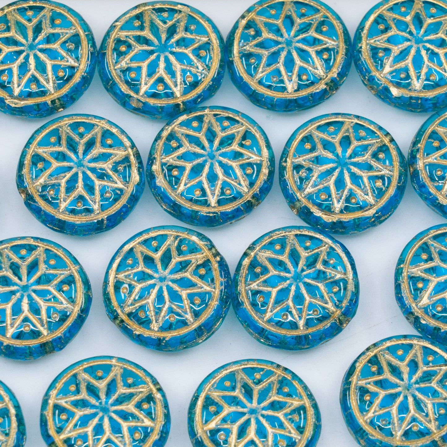 OUTLET 250g/50g Ressed Round Beads With Star Ornament, 13 x 13 mm, Transparent Aqua Gold Lined (60010-54302), Glass, Czech Republic