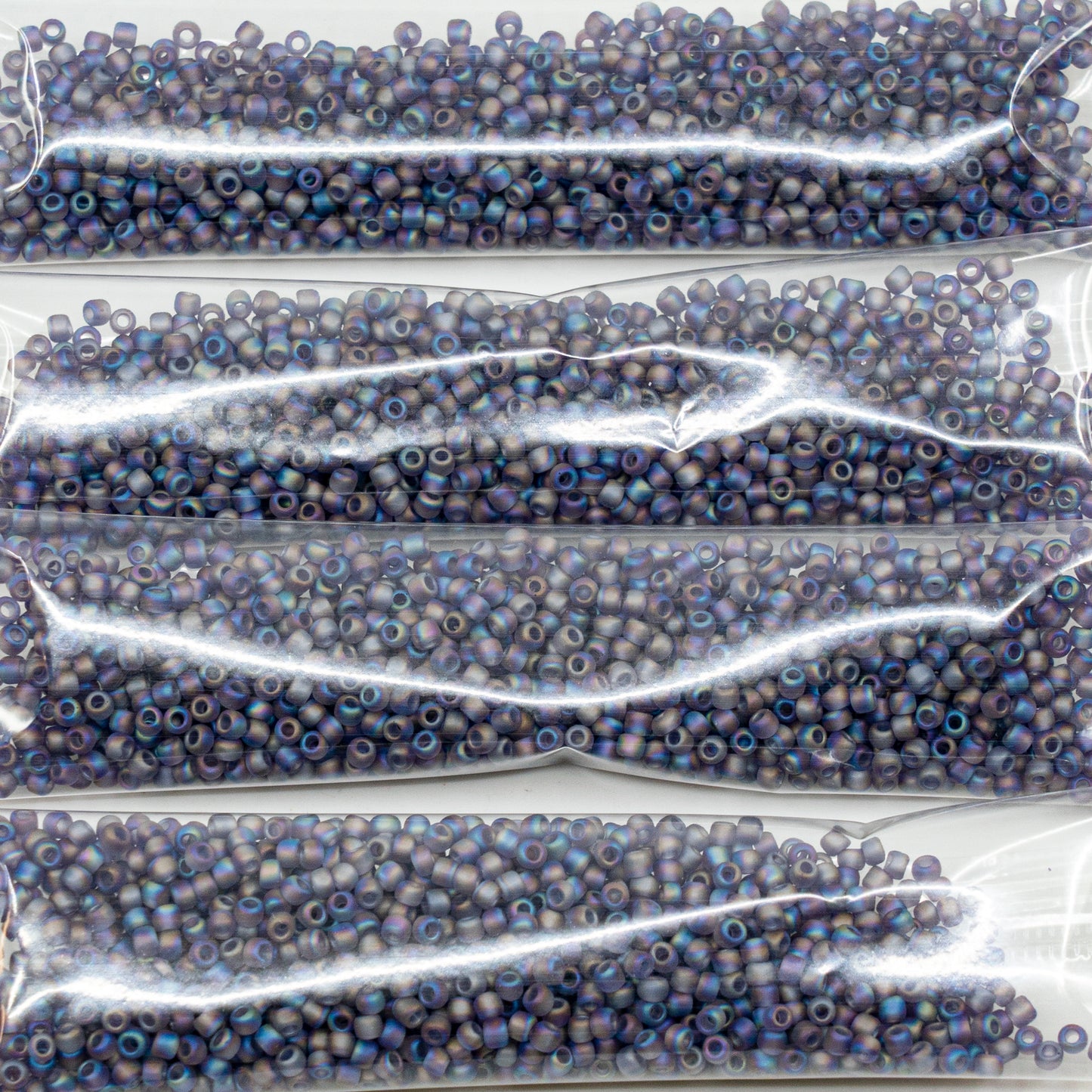 OUTLET 10 grams Toho Round 11/0 Rocailles Seed Beads, , Transparent-Rainbow-Frosted Lt Tanzanite (166DF), Glass, Japan