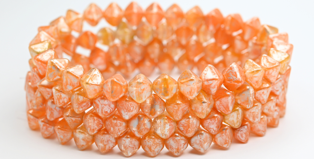 平らな双円錐形のプレスビーズ、オレンジシルバースプラッシュ(81240-86700)、ガラス、チェコ共和国