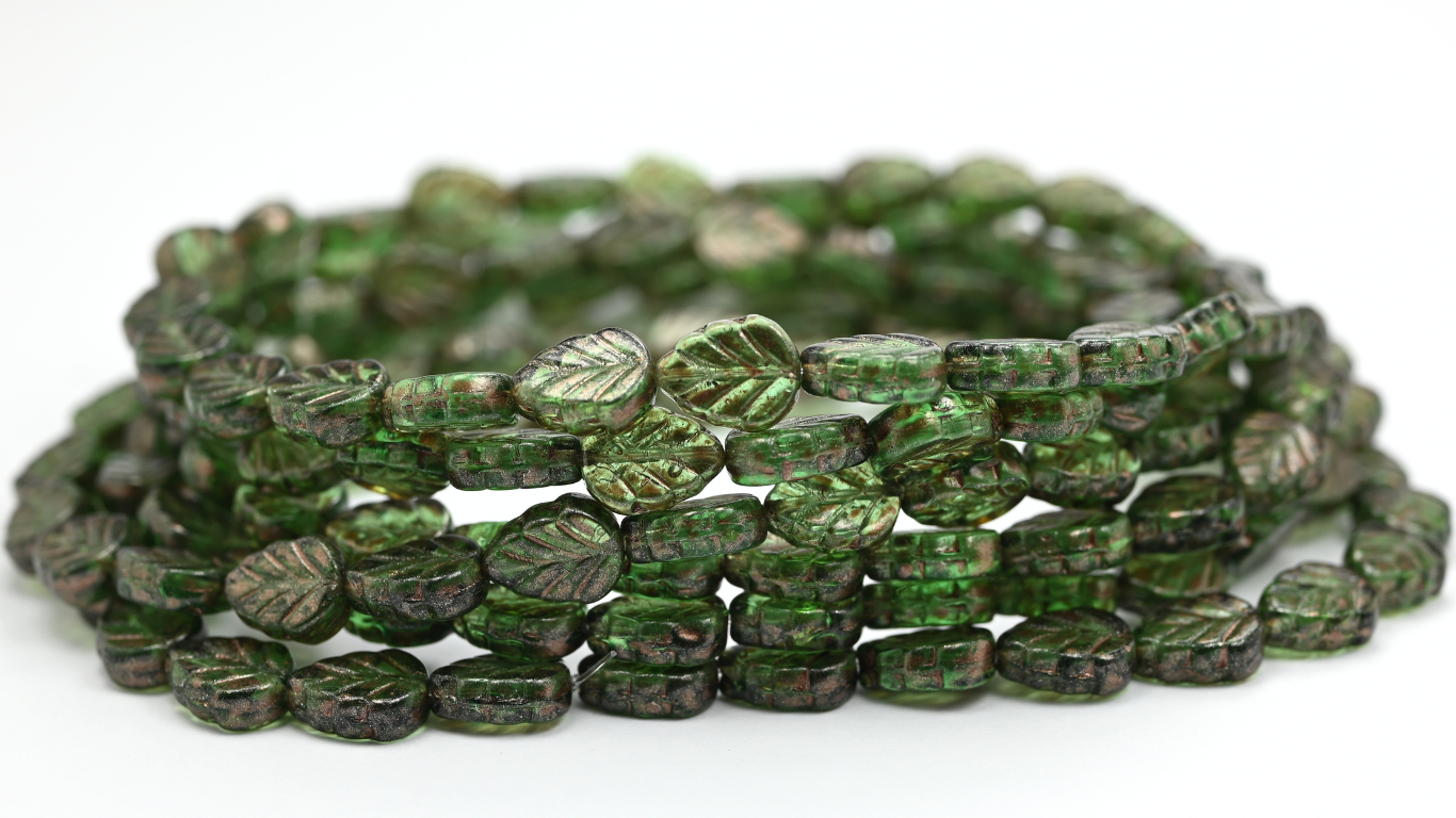 Lilac Leaf Pressed Glass Beads, Transparent Green Copper Splash (108-50500-86750), Glass, Czech Republic ~ STRANDED