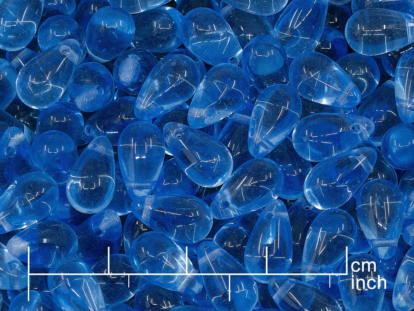 OUTLET 250g Drop Beads, 6 x 10 mm, Transparent Blue (111-69004-06x10-30020)