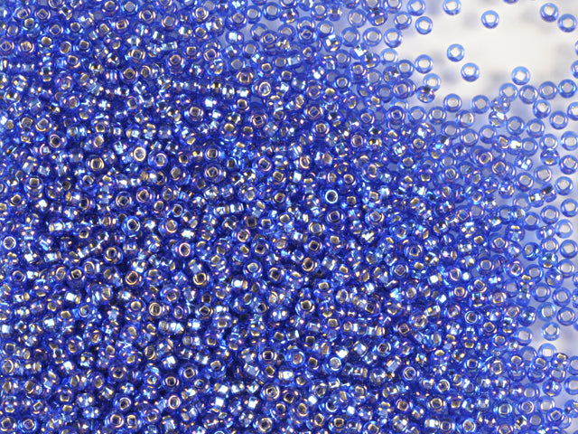 Wholesale (1kg / 500g) Preciosa Ornela Seed Beads Coated, Square Hole, Loose, Sapphire, Silver Lined, Rainbow (37059), Glass, Czech Republic, OUTLET