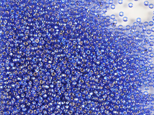 Wholesale (1kg / 500g) Preciosa Ornela Seed Beads Coated, Square Hole, Loose, Sapphire, Silver Lined, Rainbow (37059), Glass, Czech Republic, OUTLET