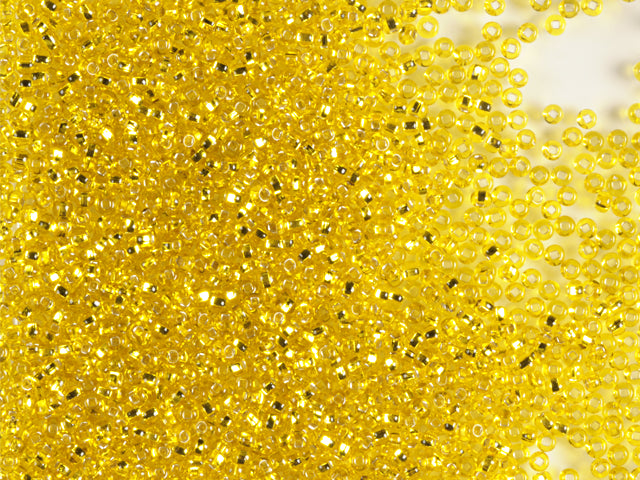 1 kg Preciosa Ornela Seed Beads Coated, Round Hole, Loose, Transp. Yellow Amber, Silver Lined (87010), Glass, Czech Republic, OUTLET