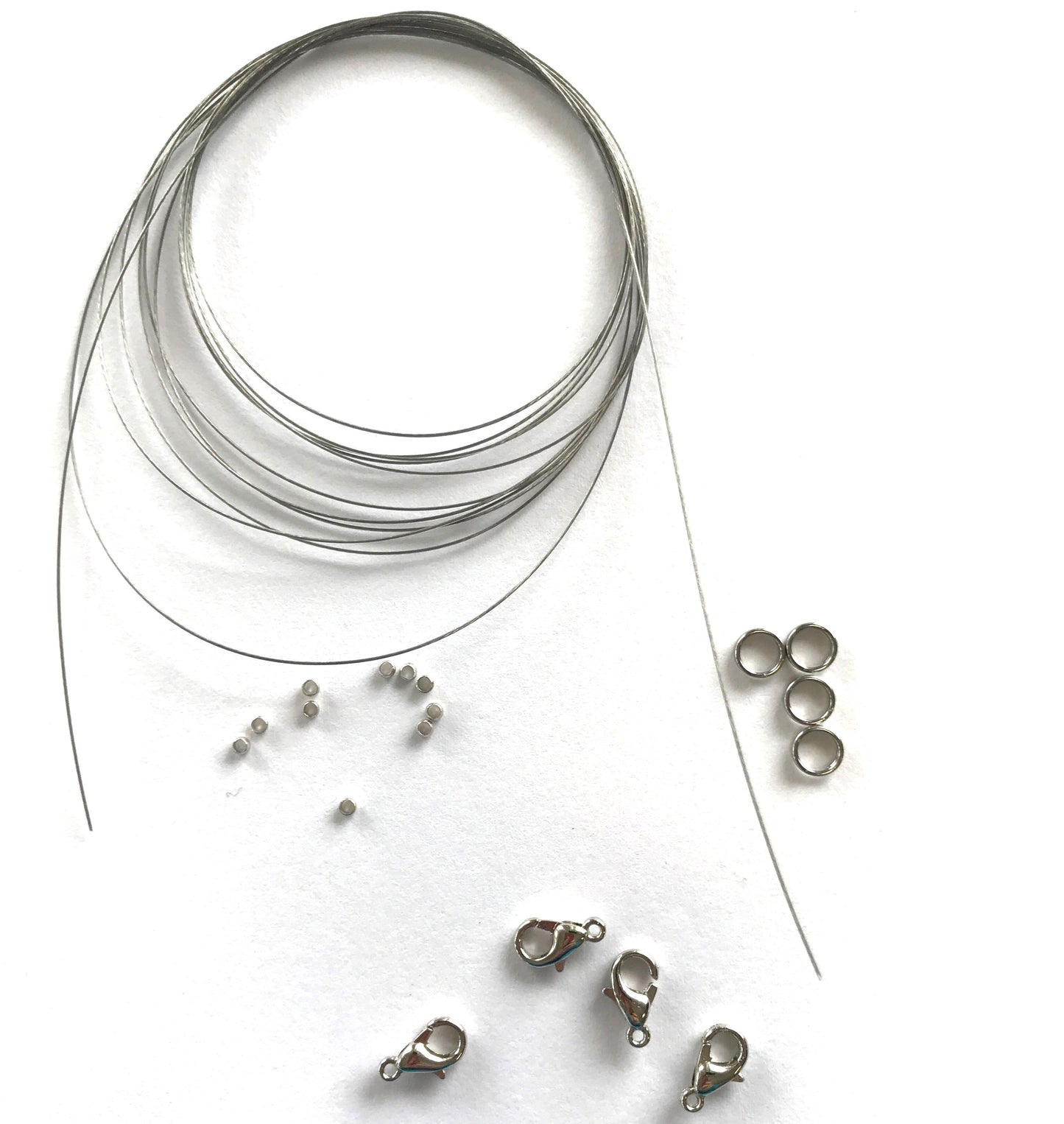 DIY Set with Steel Rope Nylon Coated (neutral color) with 4x Lobster Clasp, Crimp Beads and Jump Rings