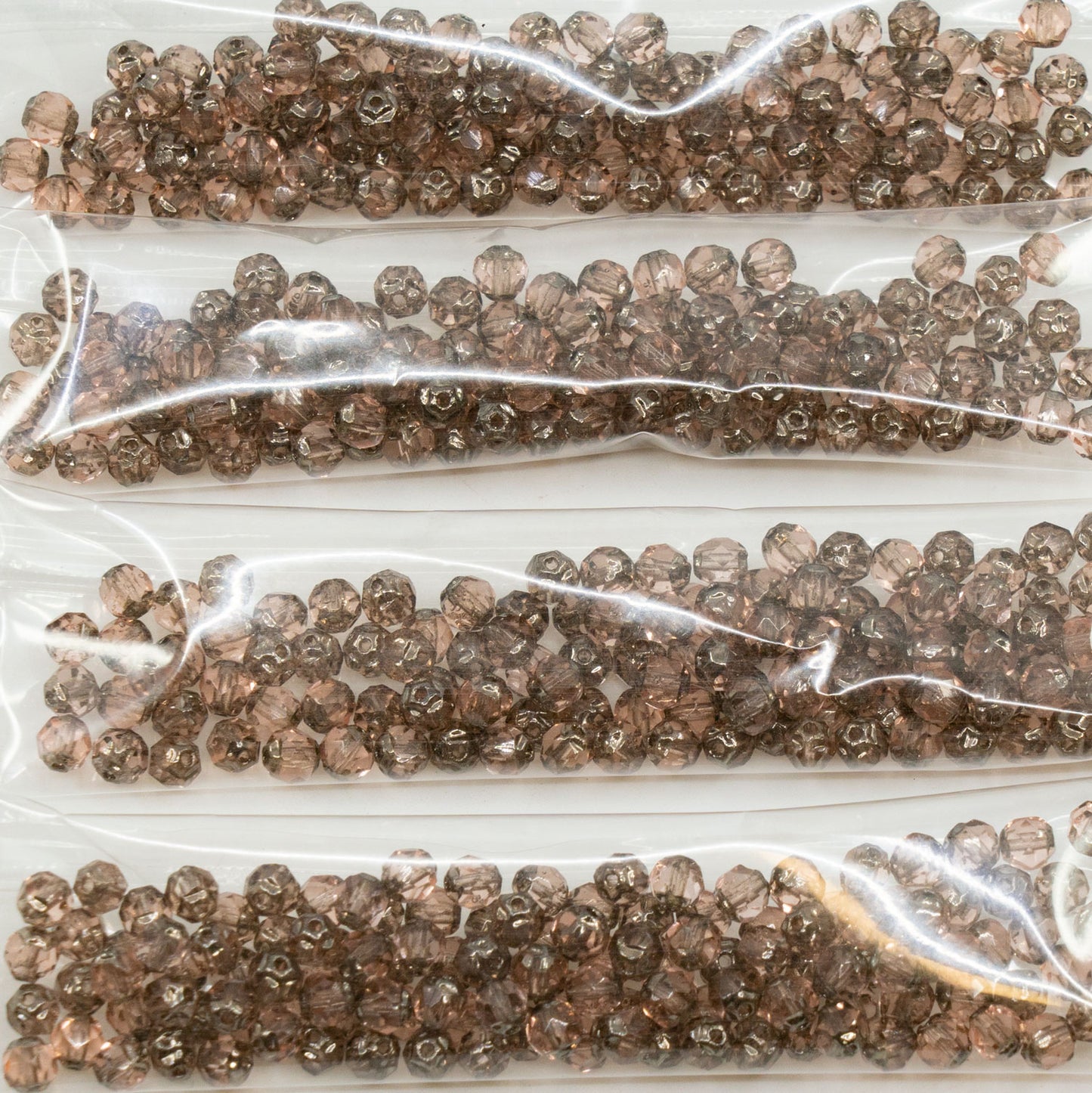 OUTLET 10 grams Fire Polished Faceted Beads Cathedral, 4 x 4 mm, Transparent Pink Platina (70110-90711), Glass, Czech Republic