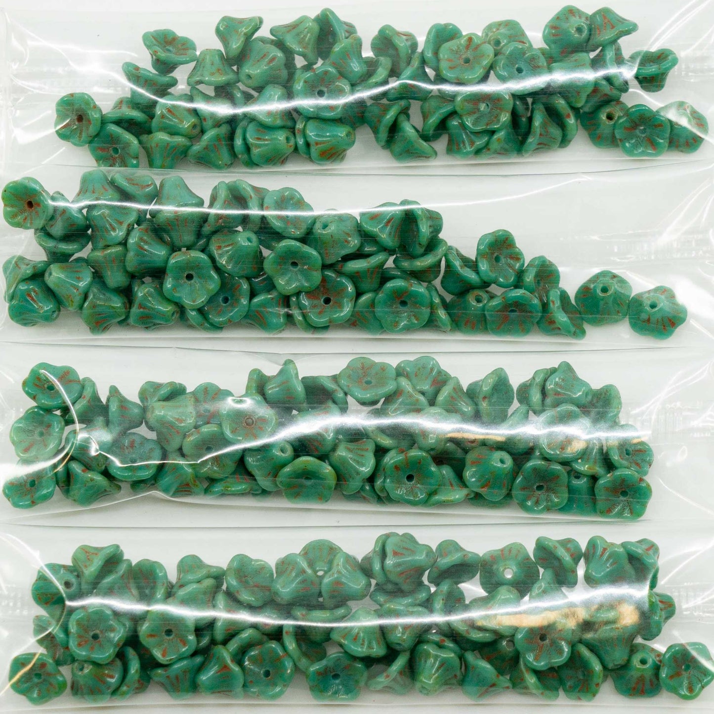 OUTLET 10 grams Bell Flower Cup Beads, 7 x 5 mm, Turquise Light Travertin (63140-86802), Glass, Czech Republic