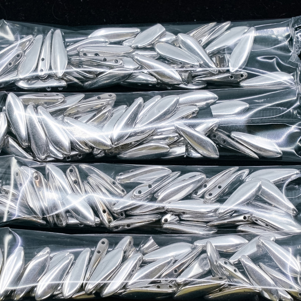 OUTLET 10 grams Dagger Beads, 5 x 16 mm, Silver (27000), Glass, Czech Republic