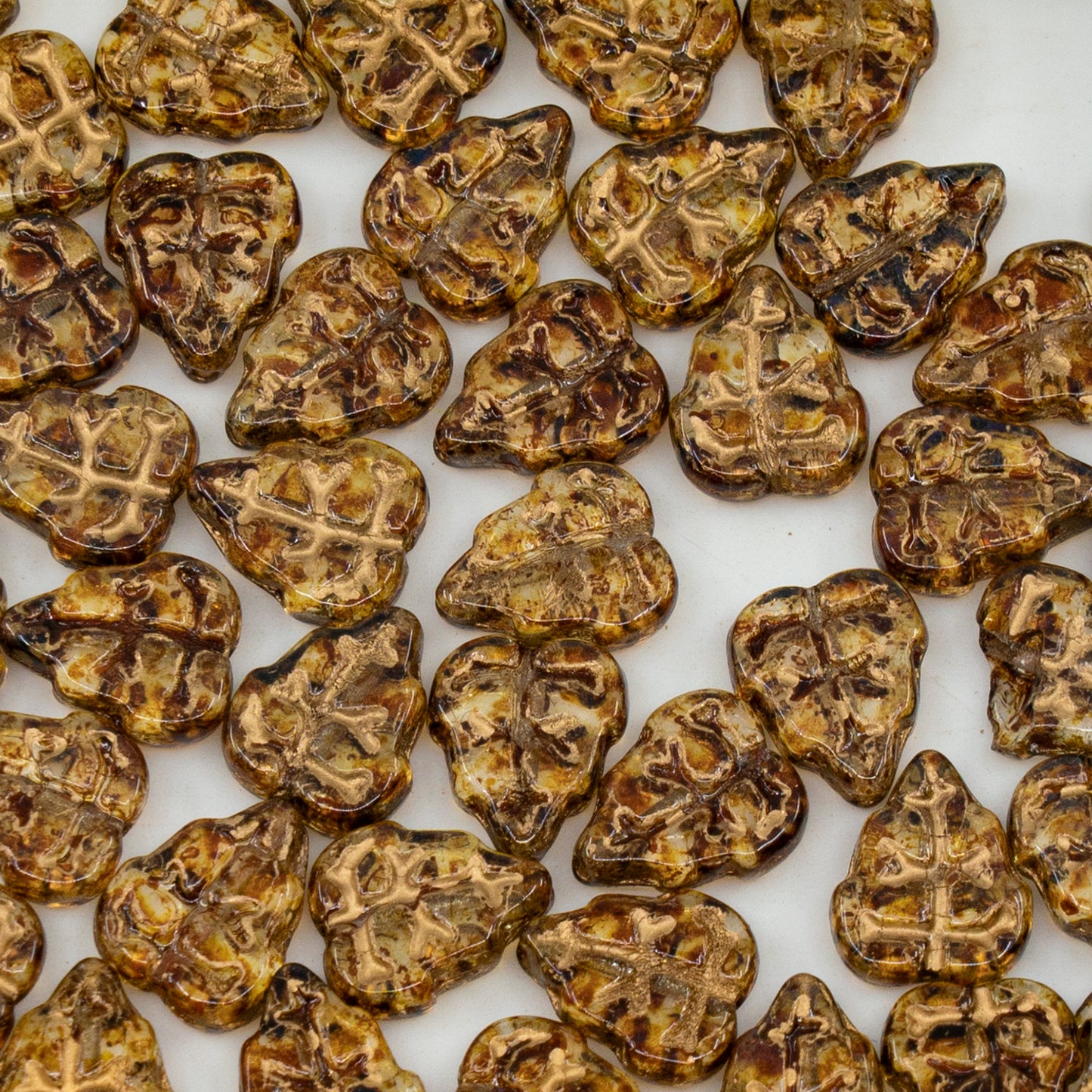 OUTLET 250g/50g Pressed Beads Leaves, 10 x 8 mm, Crystal Travertin Gold Lined (00030-86800-54302), Glass, Czech Republic