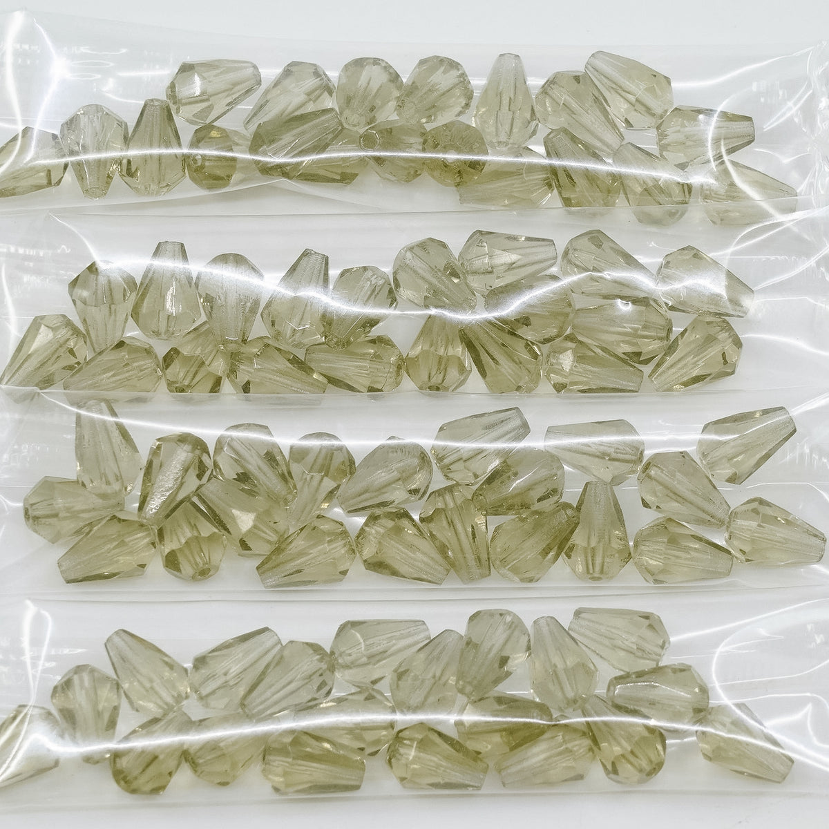 OUTLET 10 grams Pear Teardrop Beads Faceted Fire Polished, 10 x 7 mm, Gray (40000), Glass, Czech Republic