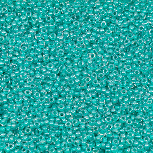 OUTLET 10 grams Preciosa Ornela Seed Beads, Round Hole, Loose, 10/0, crystal, colour lined green, sfinx (38658), Glass, Czech Republic