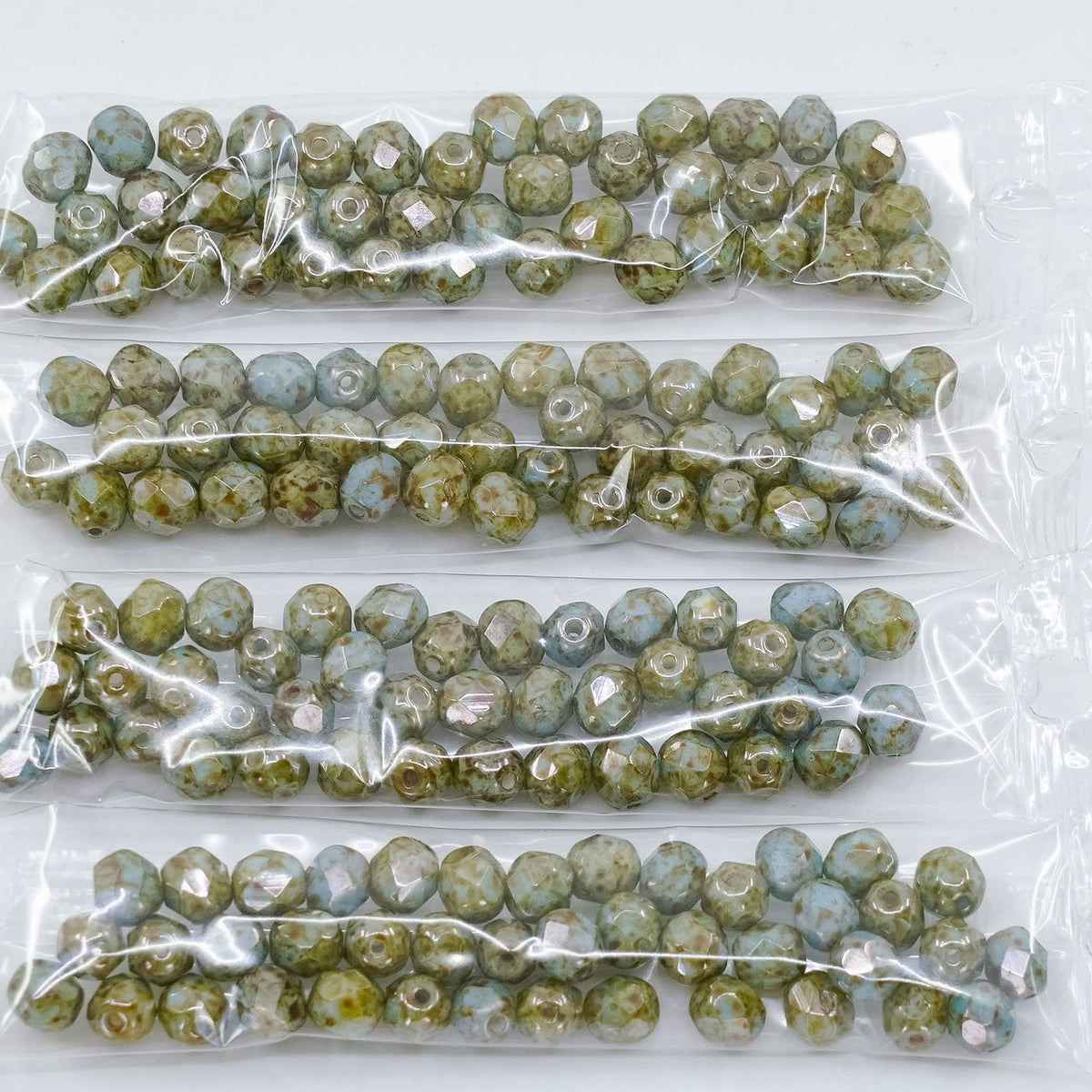 OUTLET 10 grams Faceted Round Fire Polished Beads, 6 x 6 mm, White Stain With Luster Blue (02010-65431), Glass, Czech Republic