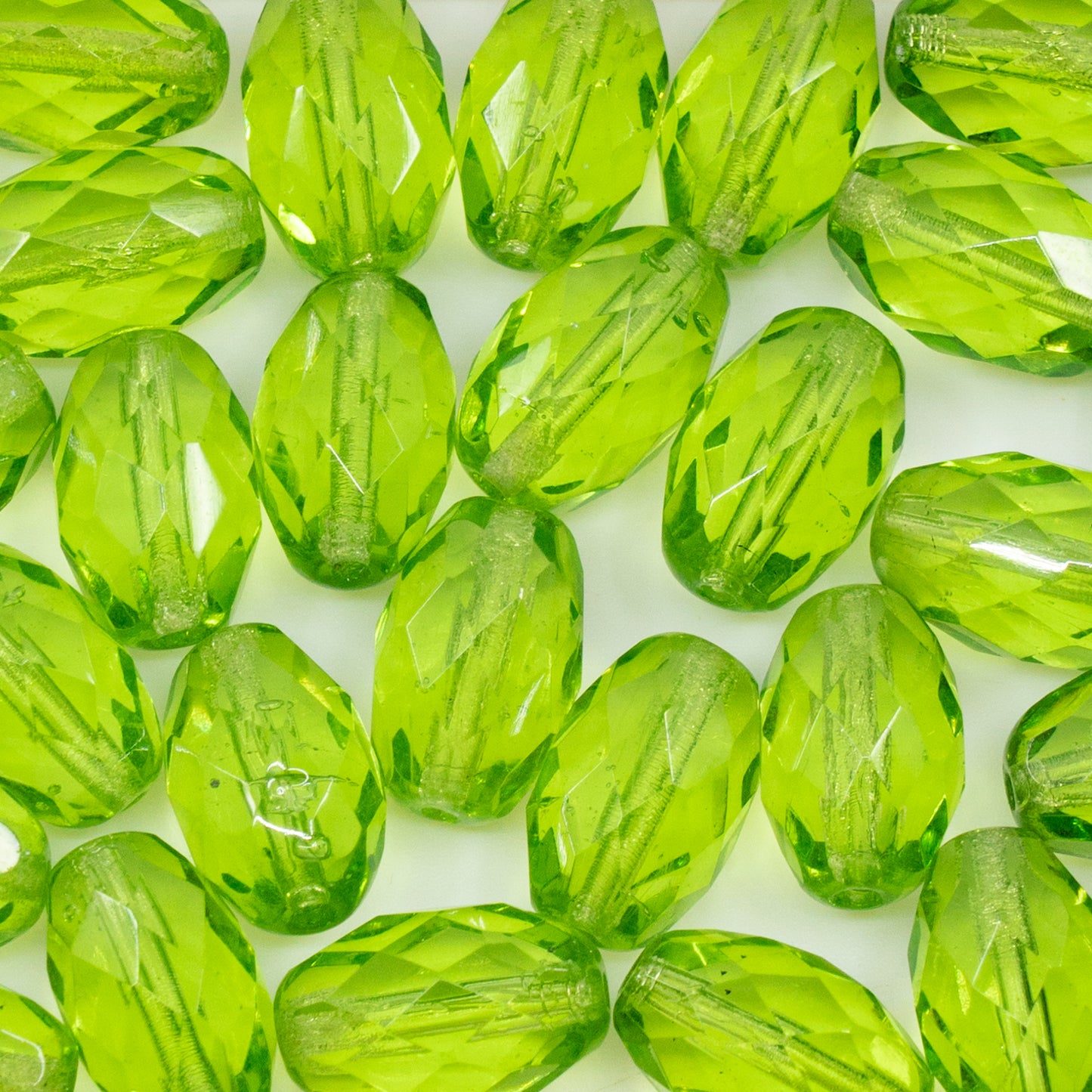 アウトレット 10グラム オーバルファセットビーズ、15 x 10 mm、透明グリーン（50400）、ガラス、チェコ共和国