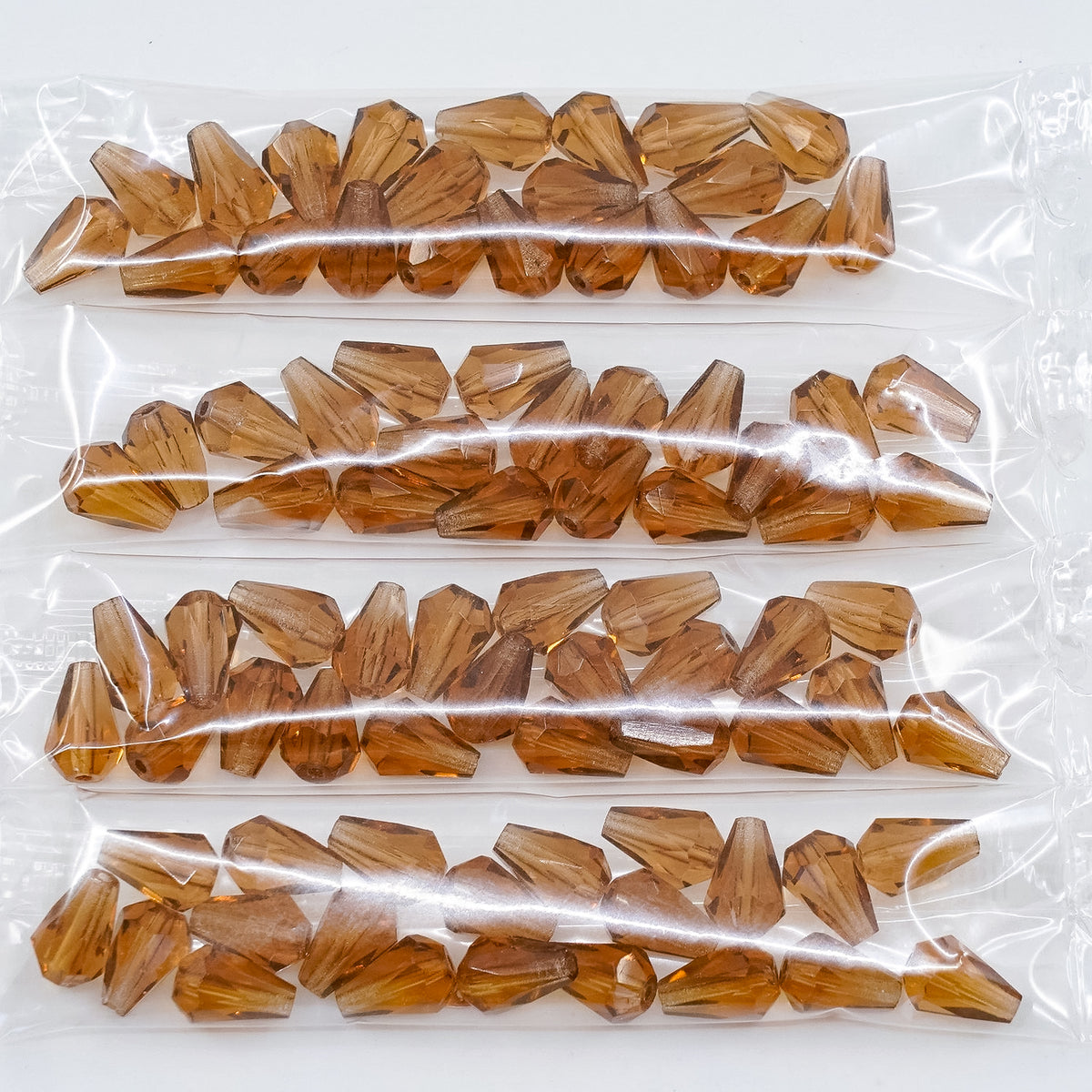 OUTLET 10 grams Pear Teardrop Beads Faceted Fire Polished, 10 x 7 mm, Transparent Orange (10080), Glass, Czech Republic