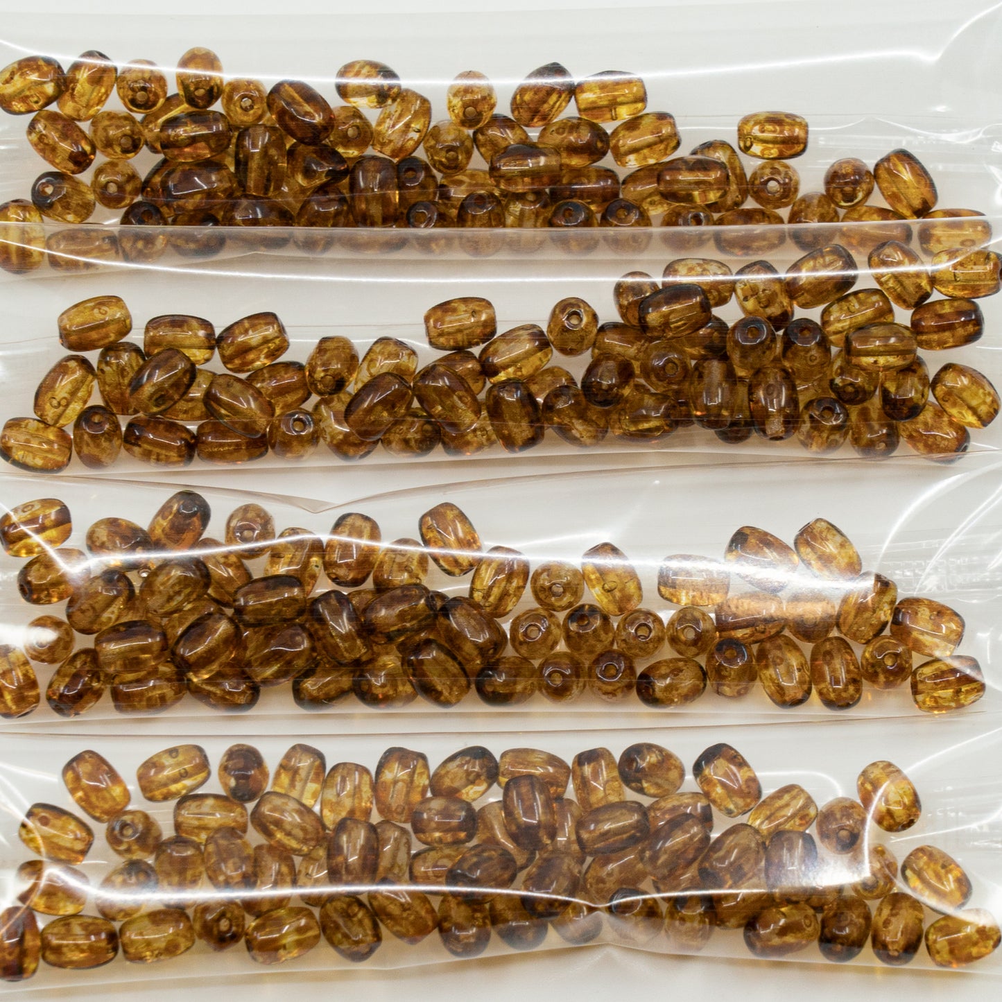 OUTLET 10 grams Olive Oval Pressed Glass Beads, 5 x 4 mm, Crystal Travertin (00030-86800), Glass, Czech Republic