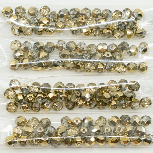 奥特莱斯 10 克多面圆形火抛光珠，水晶金（00030-26441），玻璃，捷克共和国