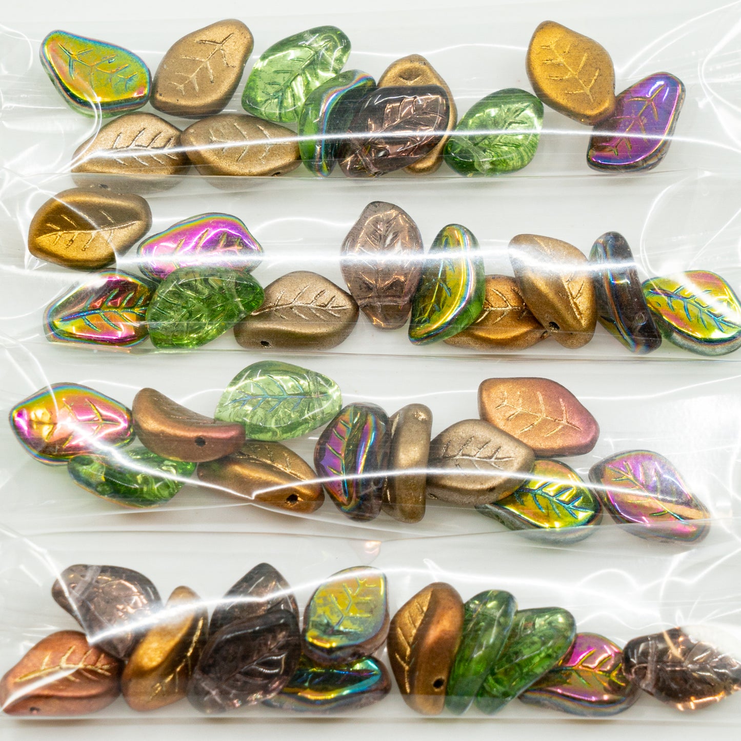 OUTLET 10 grams Wavy Leaf Beads, 9 x 14 mm, Green Gold Mixed Colors (green-gold-mix), Glass, Czech Republic